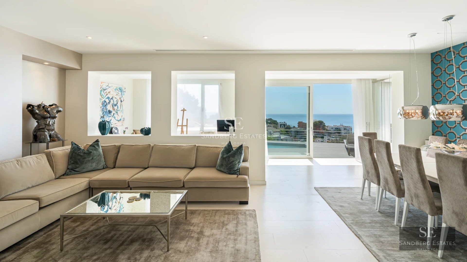 Exterior view of a modern villa with an infinity pool, lush garden, and spacious terraces. Elegant design with high-quality materials.