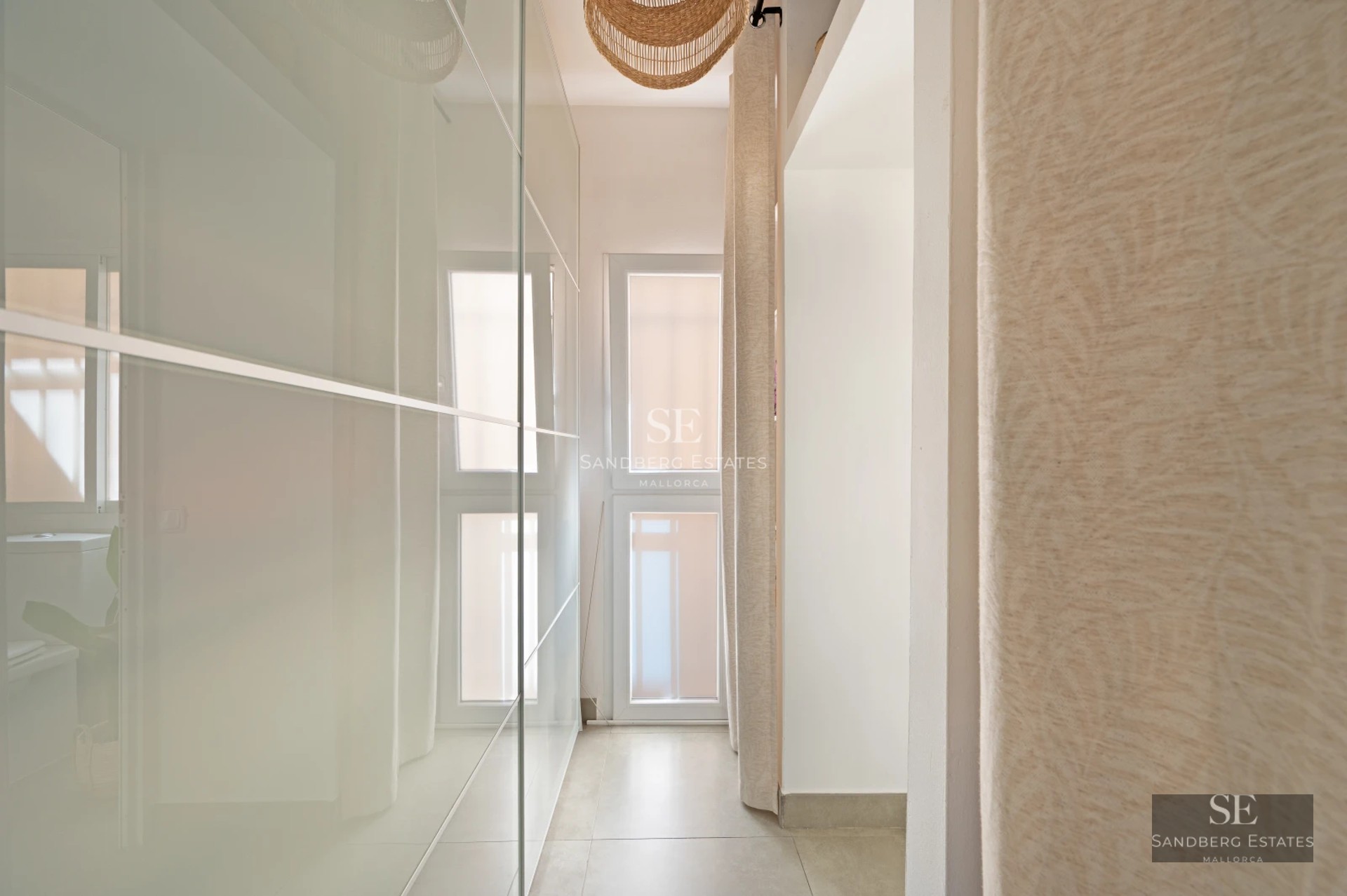 Exterior view of modern villa with pool, manicured garden, and minimalist facade. Luminous architecture with large windows.