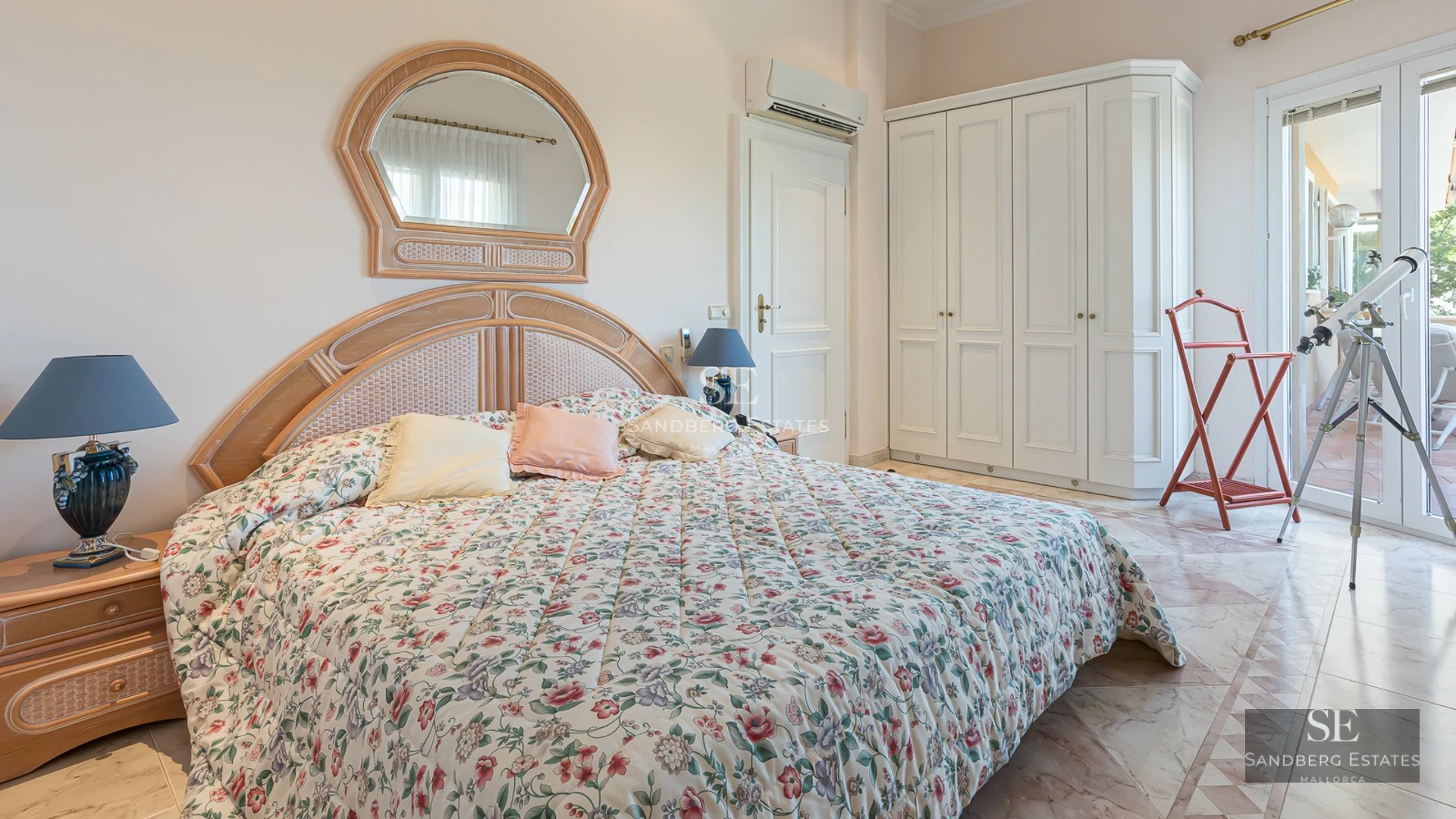 Exterior view of modern villa with infinity pool, lush garden, and minimalist architecture. Warm lighting and blue sky.