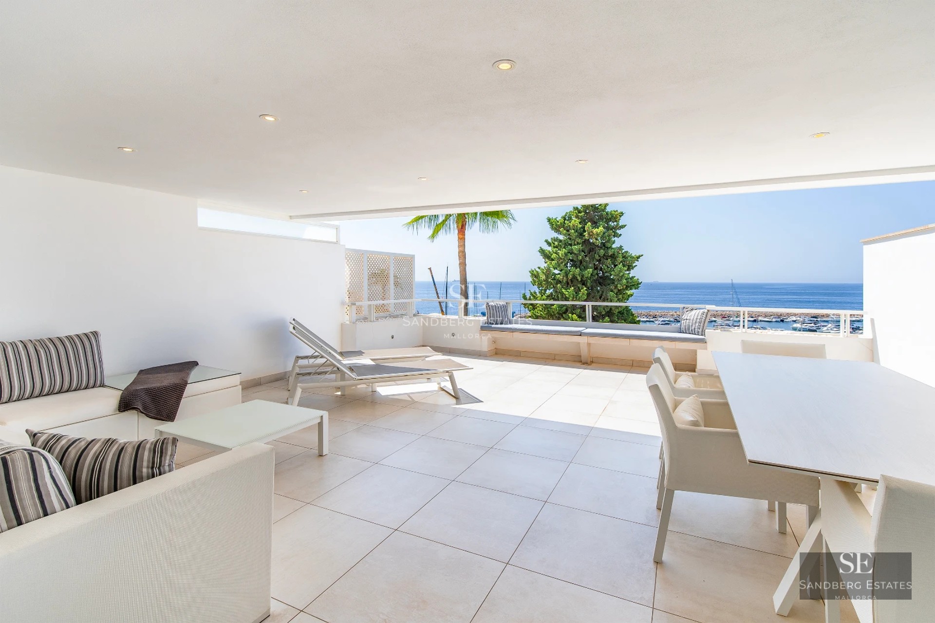 Image of a modern villa with reflecting pool, lush vegetation, and minimalist architecture. Warm lighting and natural tones.