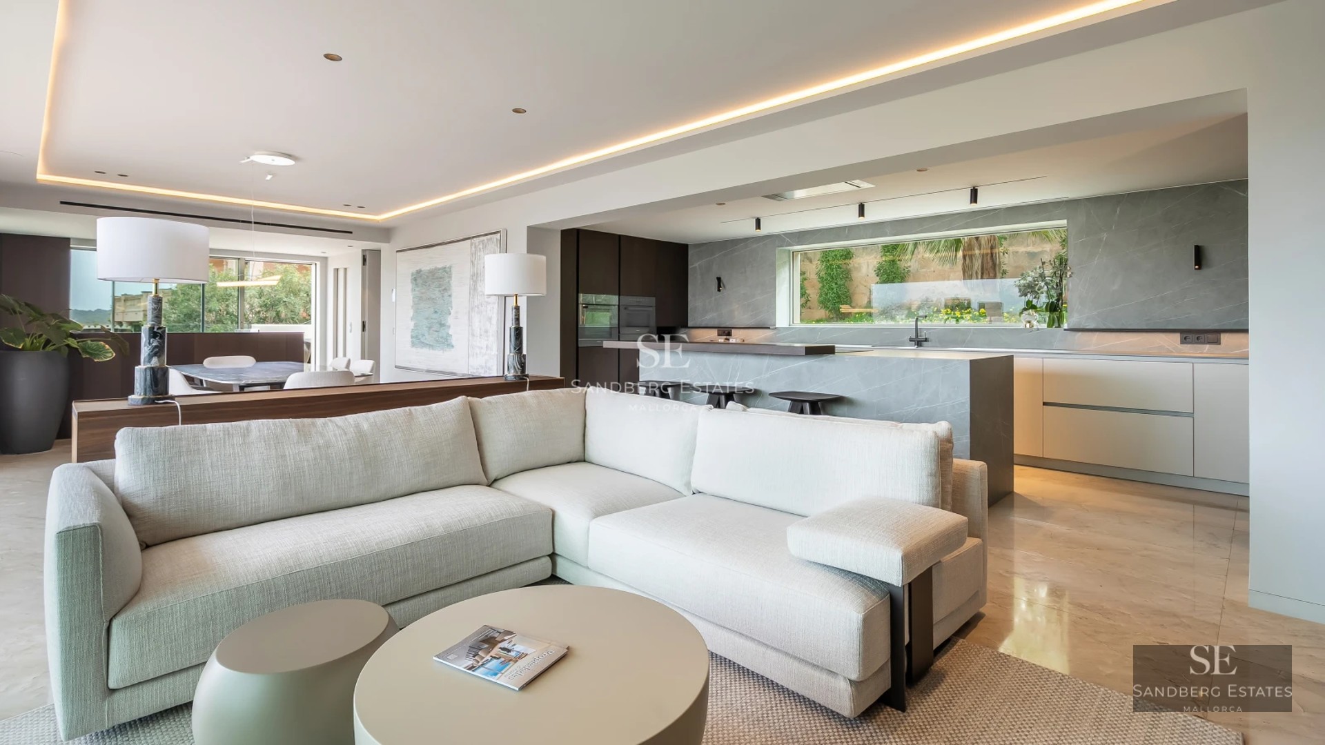 Terrace with infinity pool and panoramic views. Modern design with wooden floors and glass railing. Ambient lighting.