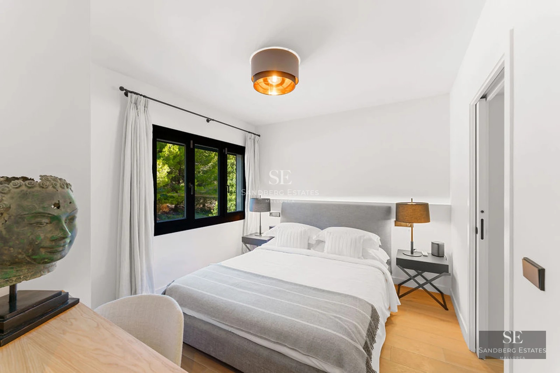 Exterior view of a modern villa with infinity pool. Minimalist design, spacious terraces, and lush greenery. Luxury and comfort.