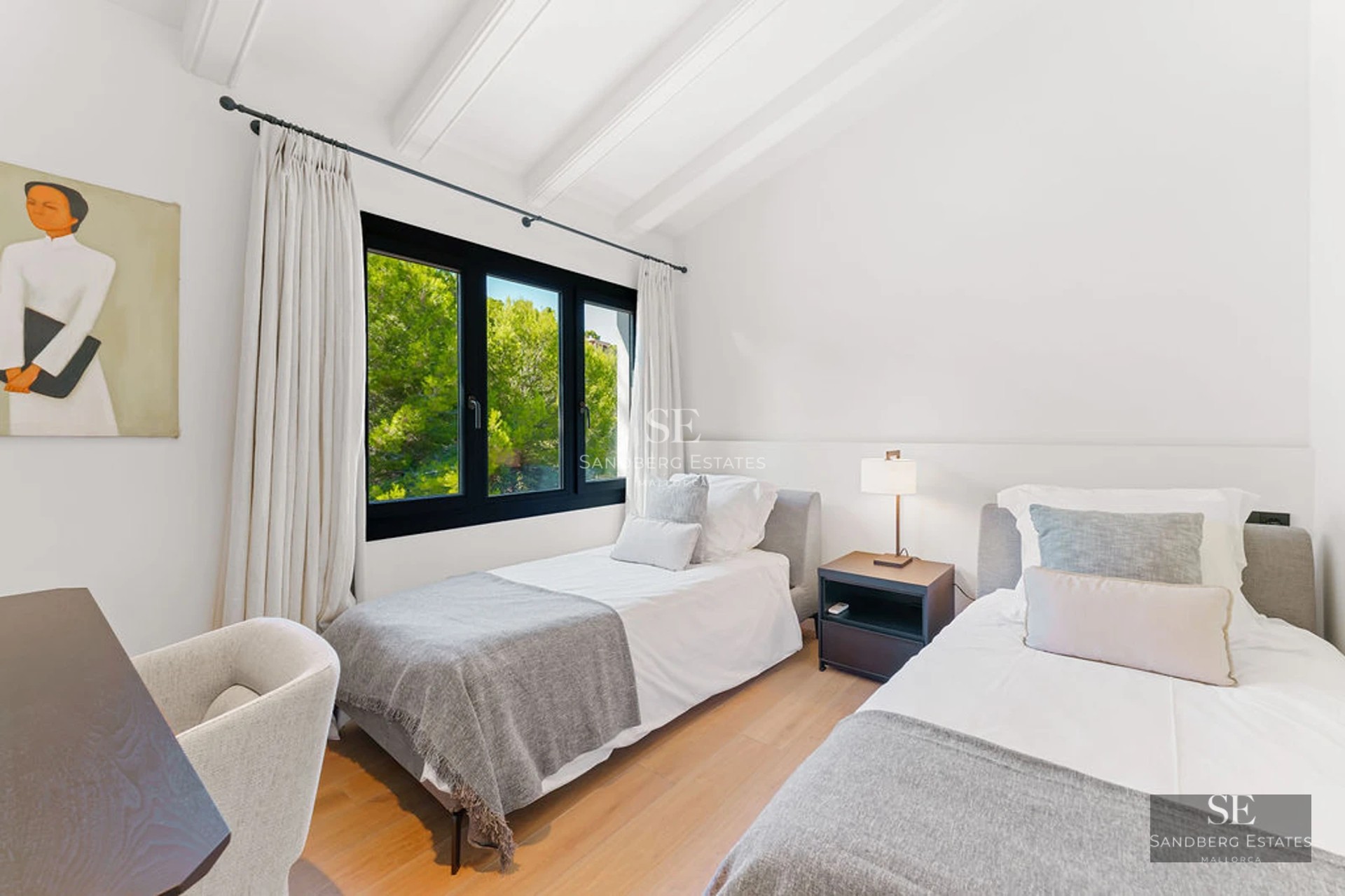 View from a modern balcony with glass railing, light tile flooring, and panoramic sea views. Minimalist architecture.