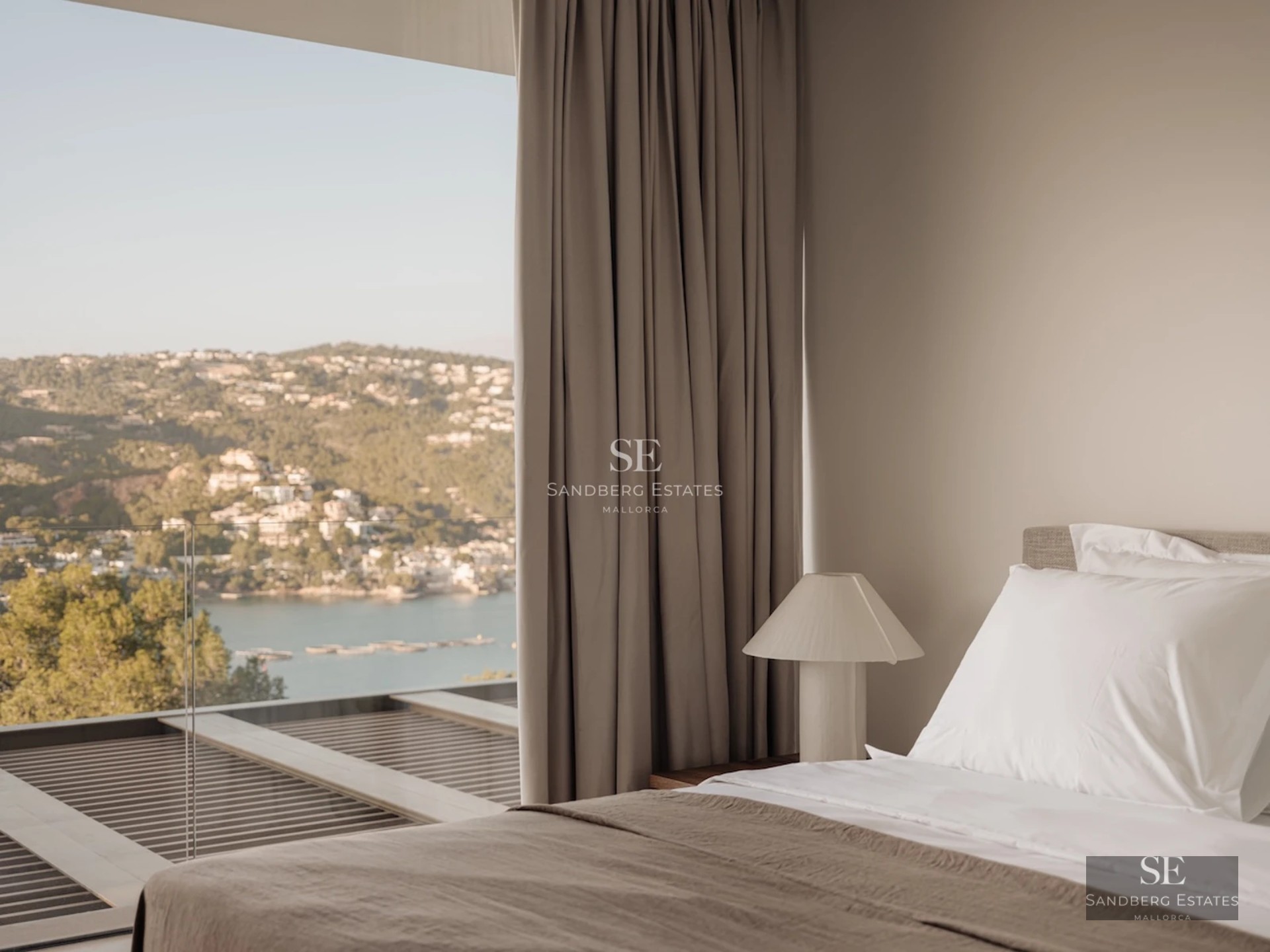 Exterior view of a modern villa with reflecting pool. Minimalist design, warm lighting, lush landscaping, and blue skies.