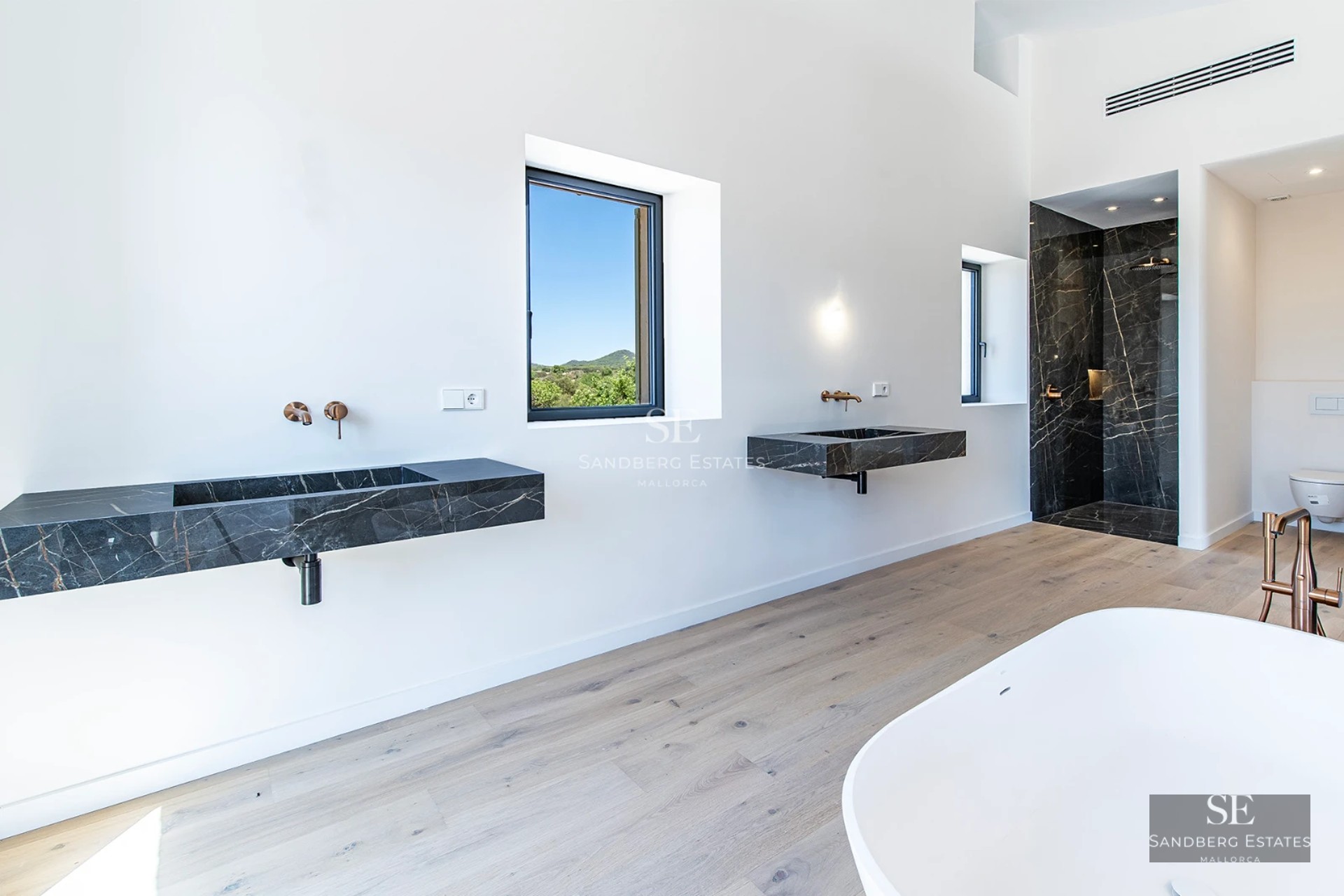 Infinity pool view with vanishing edge, sun loungers, and lush tropical landscape. Modern architecture and minimalist design.