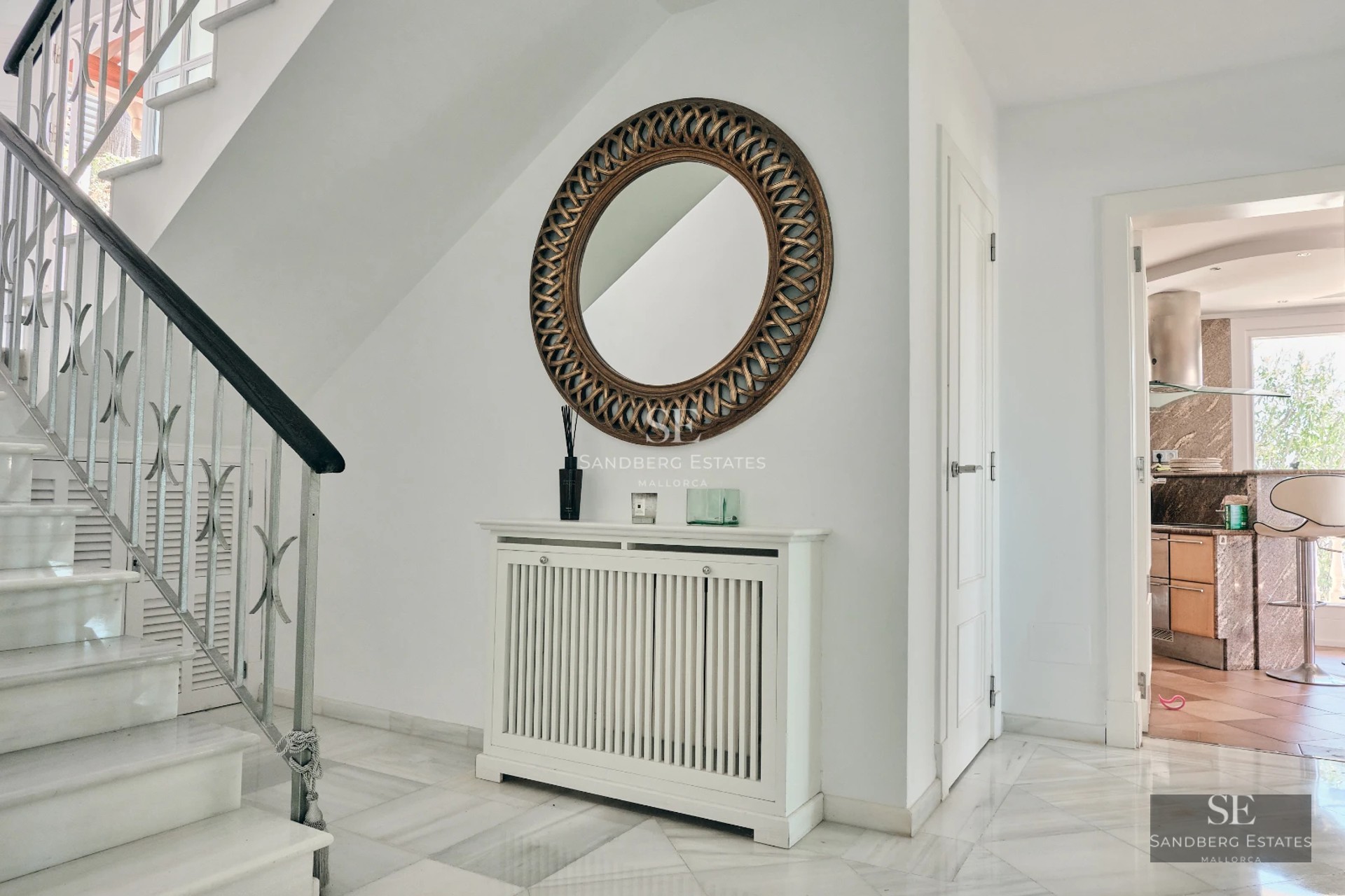 Spacious living room with floor-to-ceiling windows, infinity pool, and ocean view. Modern design, high-end finishes, and abundant natural light.