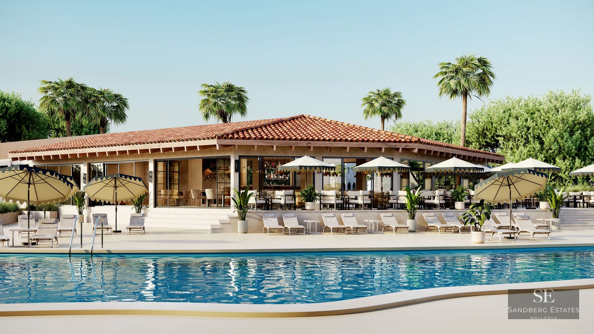 A wide turquoise swimming pool surrounded by white sunbeds and umbrellas in front of a Mediterranean pavilion with palms.