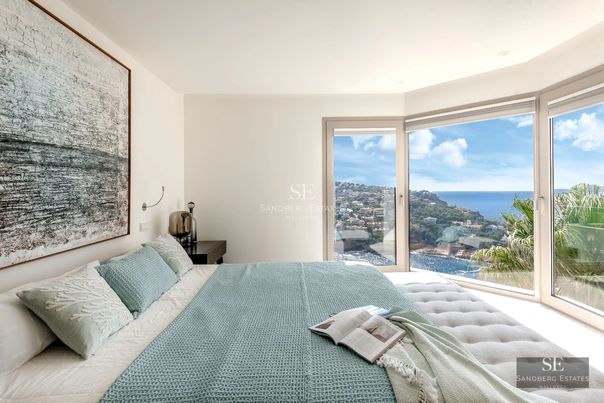 Expansive terrace with pool, sun loungers, and panoramic views. Modern design with stylish outdoor furniture and manicured landscaping.