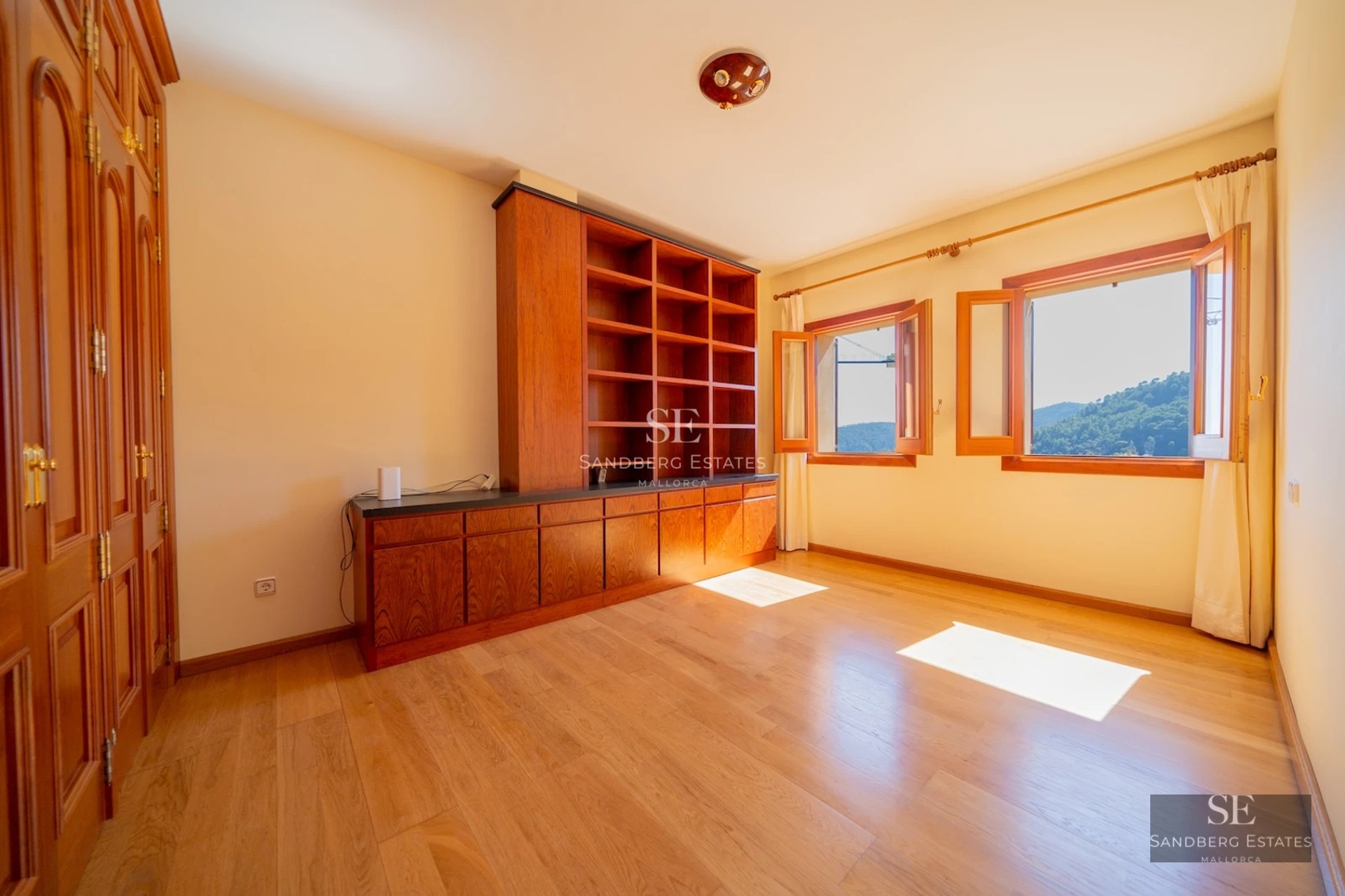 Exterior view of a modern villa with a pool, lush garden, and expansive outdoor living areas. Minimalist architecture and abundant natural light.
