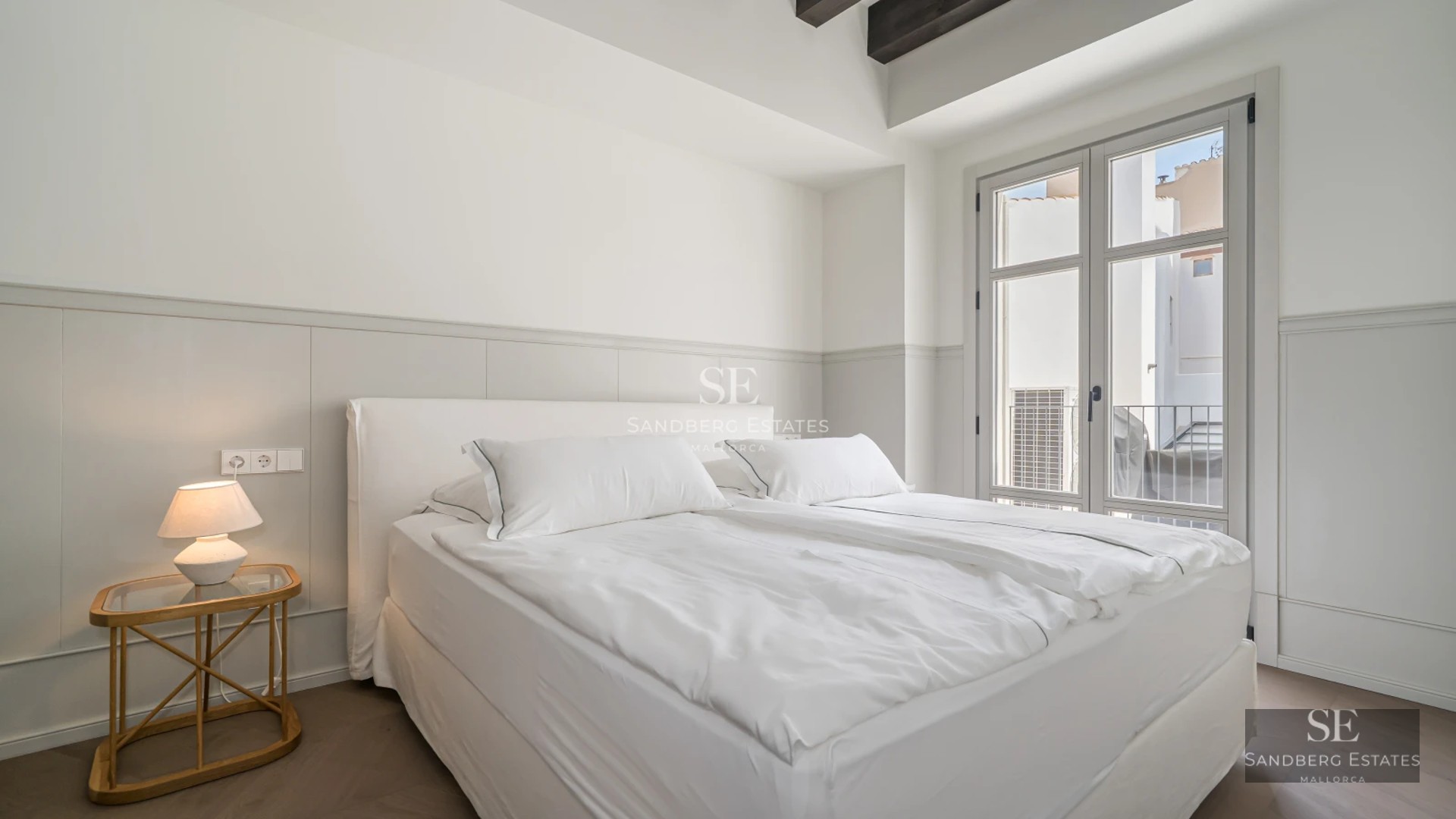 Pool view with sun deck, modern loungers and lush greenery. Minimalist architecture with large windows.