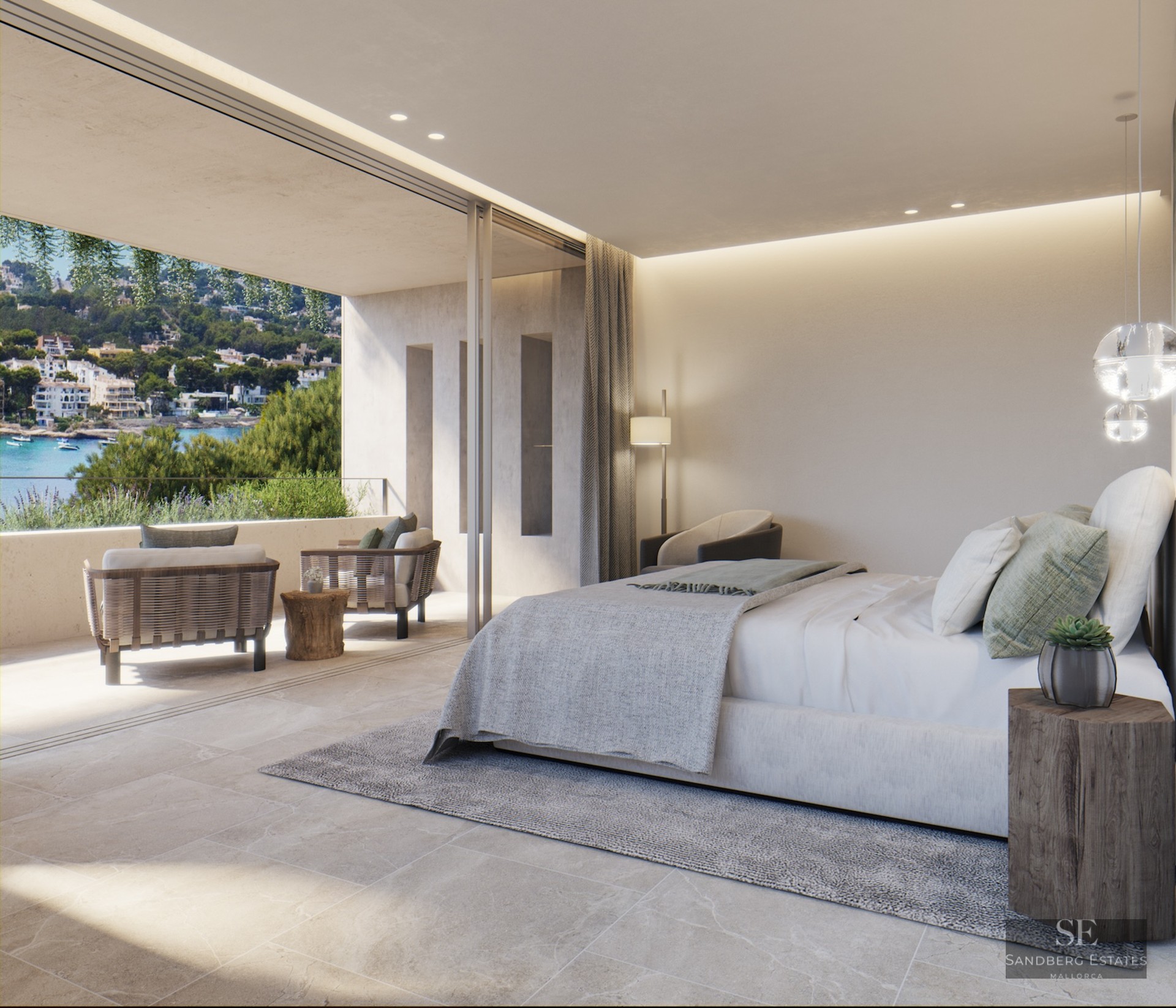 Luxury master suite featuring a large bed, stone floors, and a private terrace overlooking a scenic coastal bay.