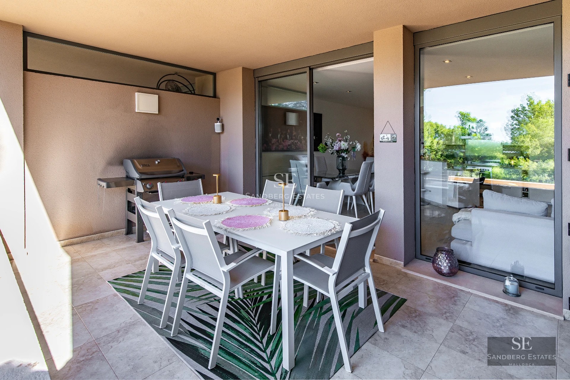 Exterior view of a modern villa with a pool, clean minimalist architecture, abundant natural light, and manicured landscaping.