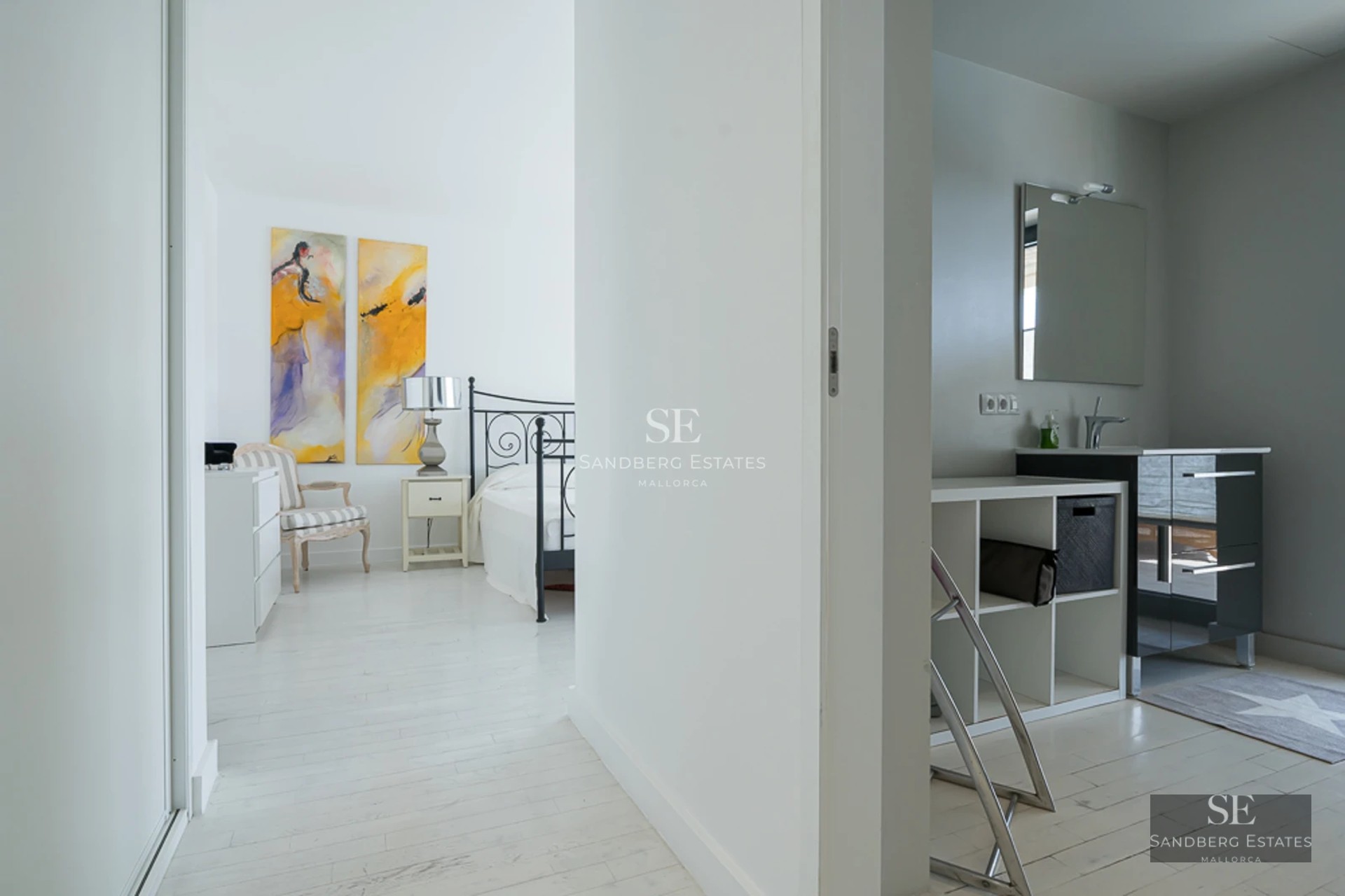 Expansive terrace with infinity pool, sun loungers, and panoramic views. Modern and minimalist architecture.