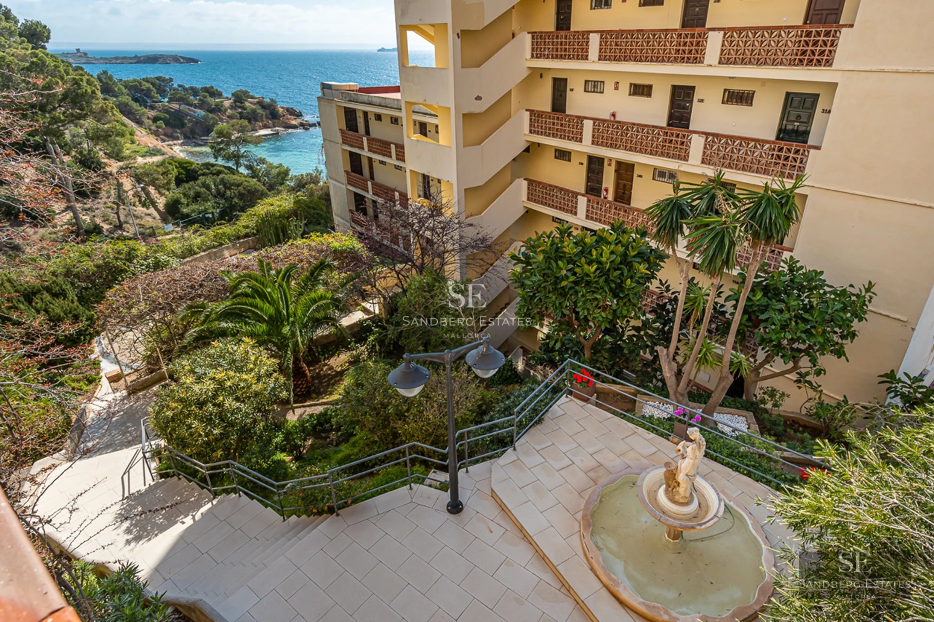 Exterior of modern villa with infinity pool, manicured lawn, and large windows. Minimalist design and abundant natural light.