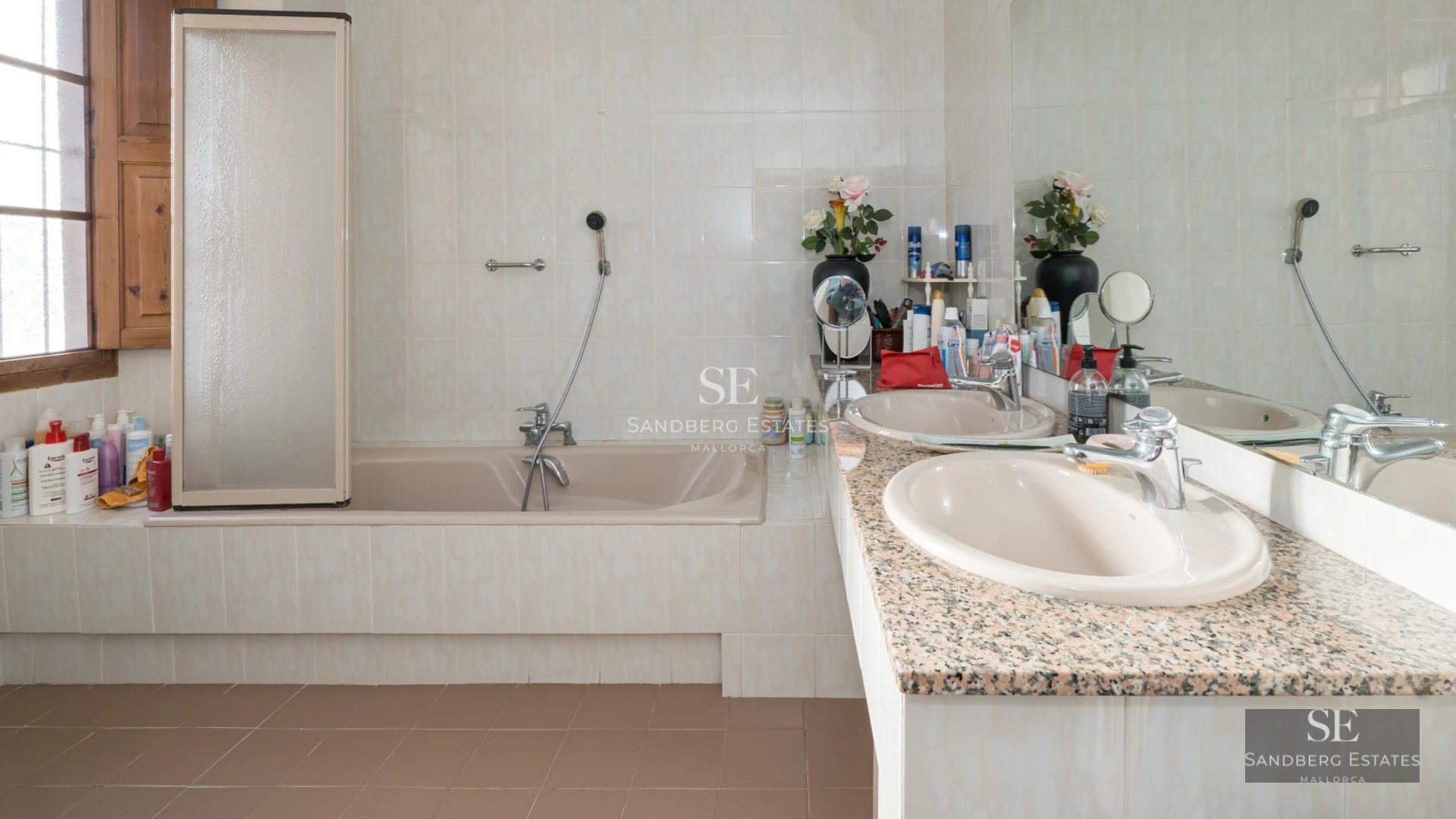 View of modern villa with reflecting pool. Minimalist architecture, large windows and lush landscaping.