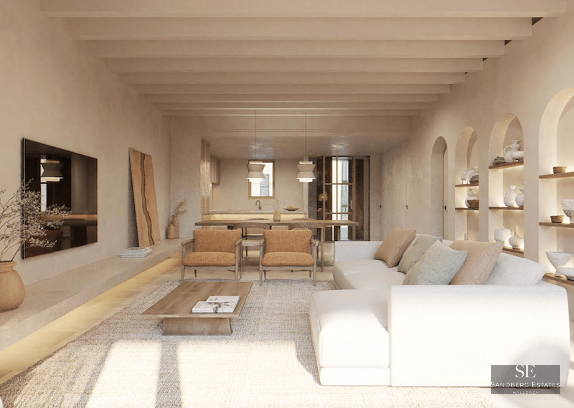 Bright living room with white sofa, wooden ceiling beams, and arched wall niches displaying ceramic pottery.