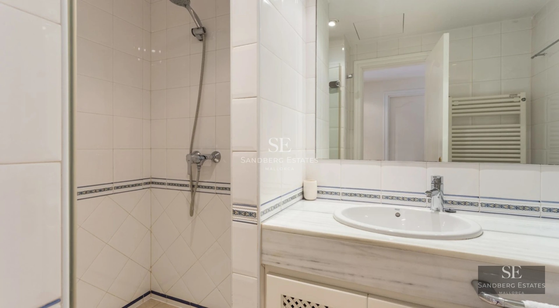 Expansive terrace with infinity pool, panoramic sea views, elegant furniture, and modern architecture. Luxurious outdoor space.