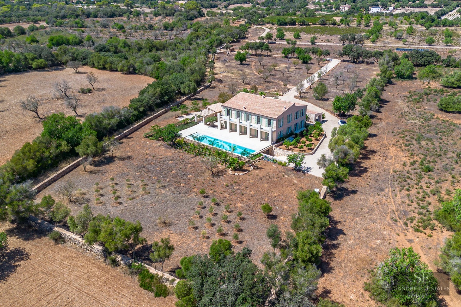Spacious terrace with infinity pool, sea view. Modern architecture, stylish outdoor furniture, relaxing and bright atmosphere.
