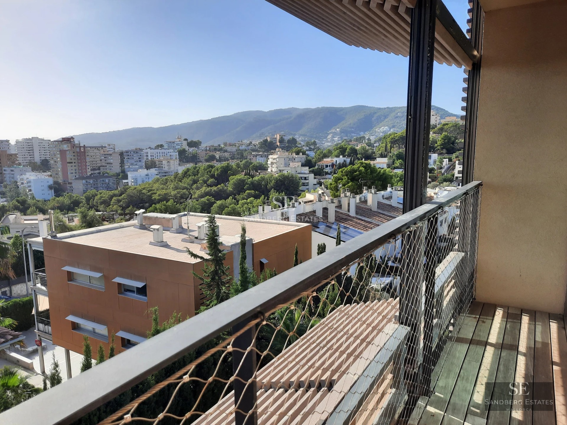 Exterior view of a modern villa with infinity pool, lush garden, and spacious terraces. Elegant and minimalist architecture.