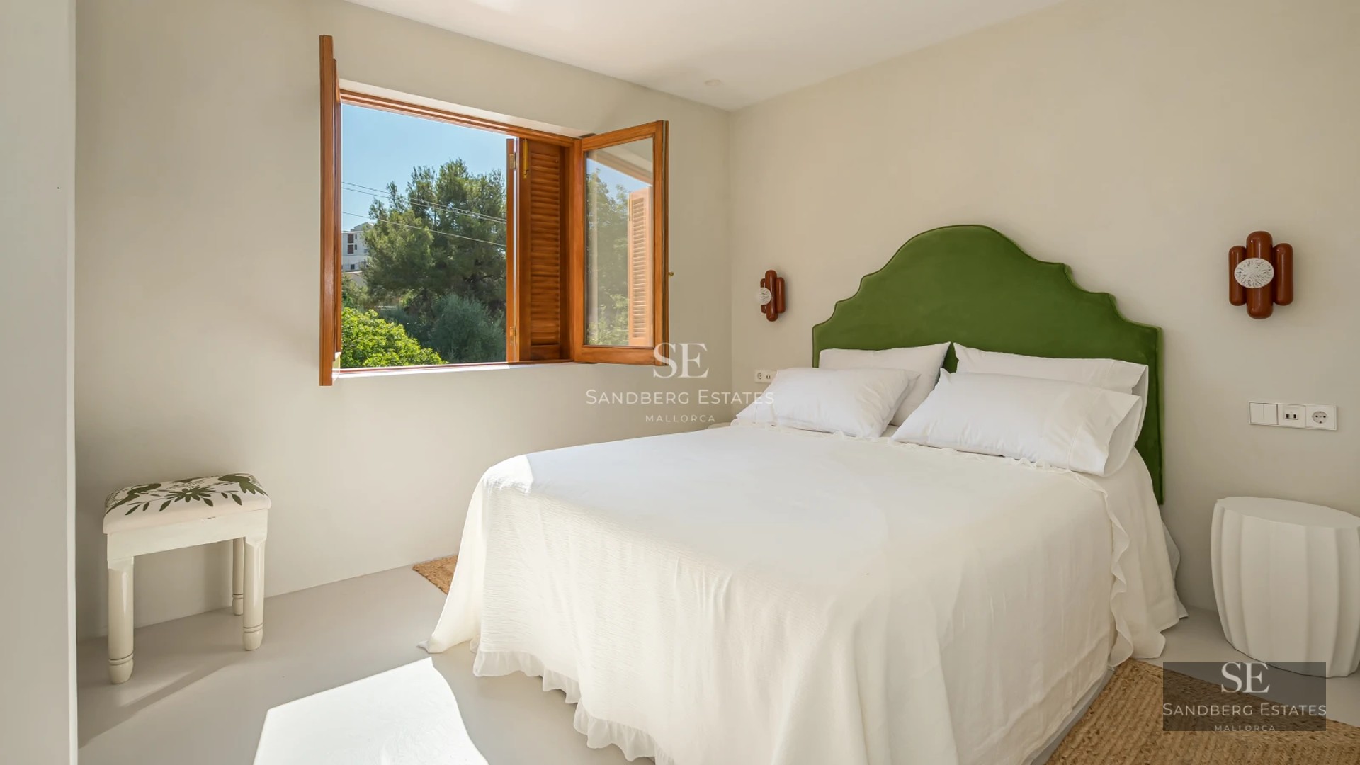 Aerial view of a modern villa with infinity pool, lush garden, and spacious terraces. Minimalist architecture and contemporary design.