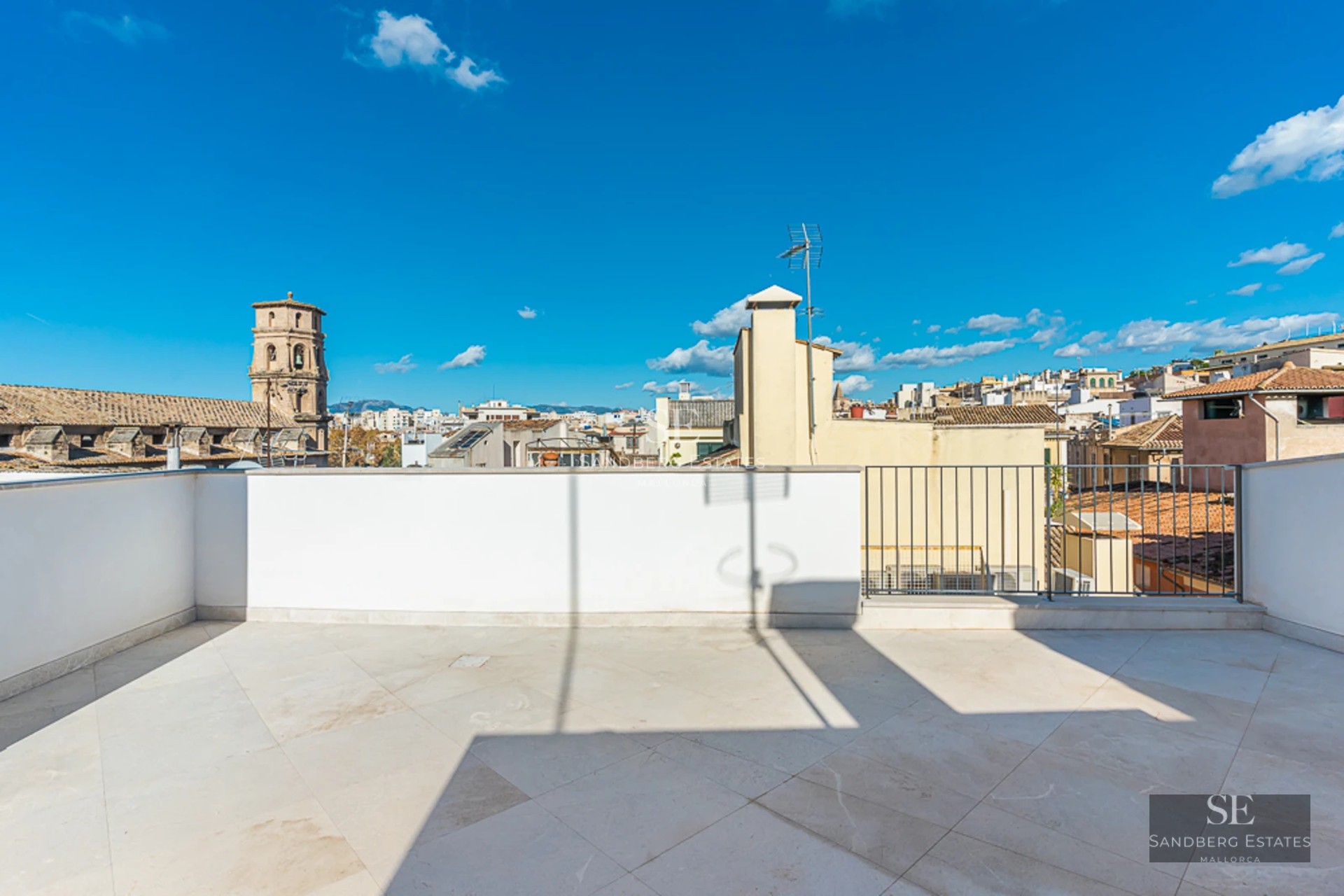 Exterior view of a modern villa featuring a pool, garden, and expansive terraces. Sleek architectural design with large windows and clean lines.