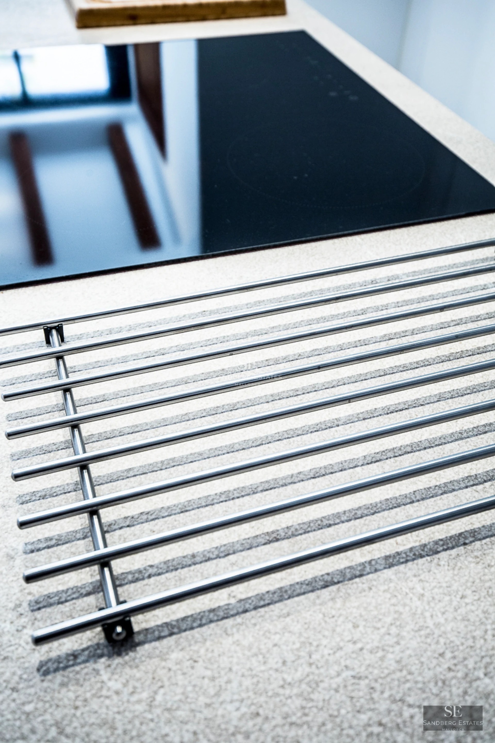 Expansive terrace with pool, modern furniture, and unobstructed views. Sleek, minimalist architecture.