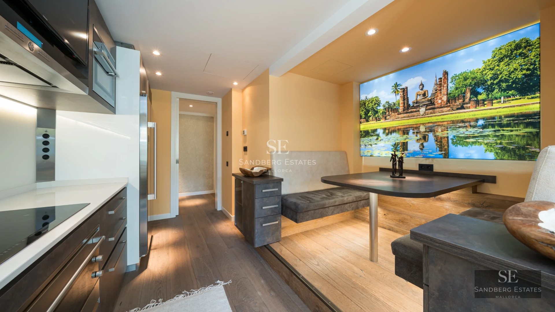 Aerial view of a luxury villa featuring an infinity pool, garden, and modern design. Minimalist architecture and impeccable landscaping.