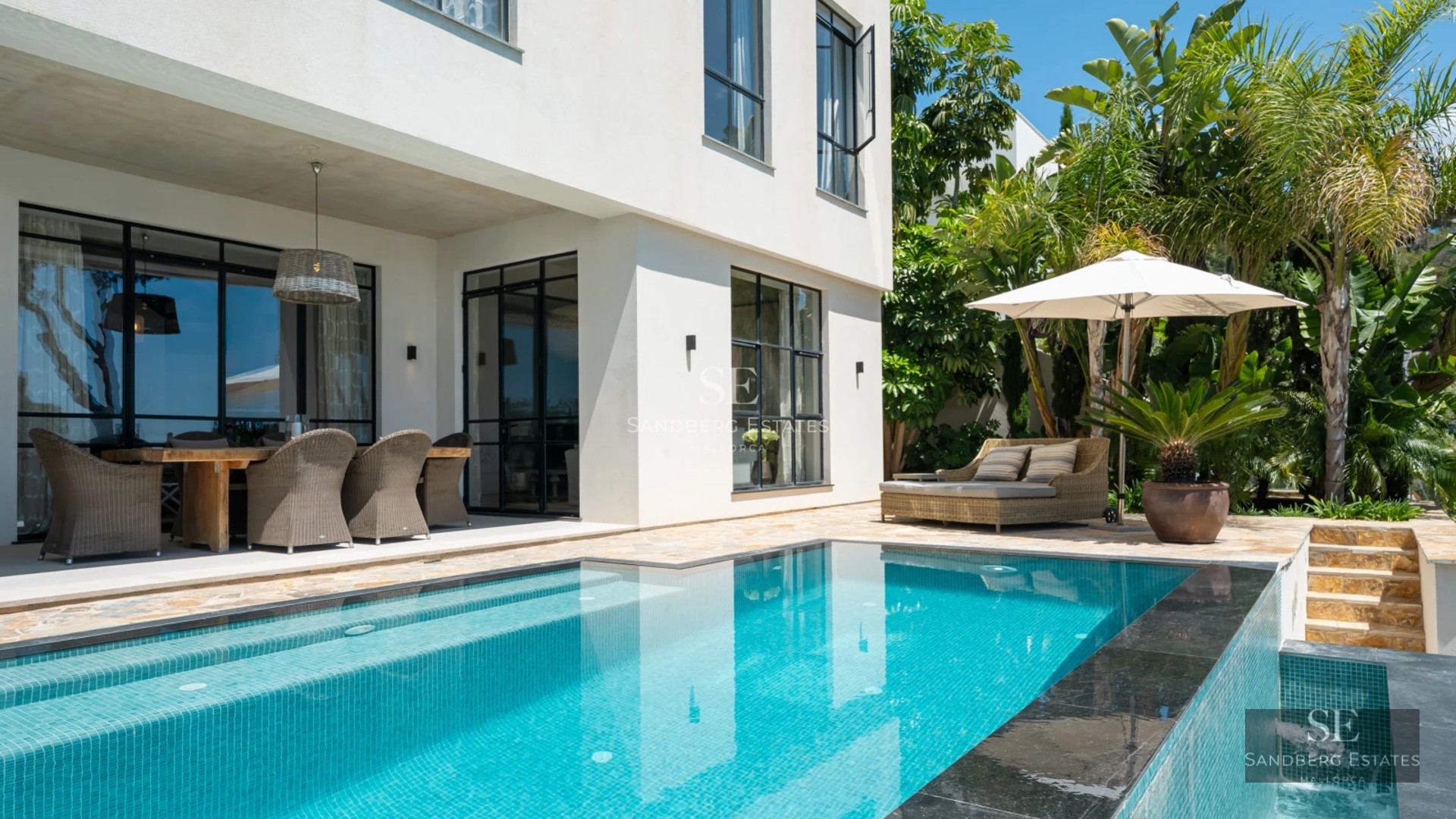 Spacious terrace with pool, well-maintained garden, and modern facade. Ideal for enjoying the outdoors in style and comfort.