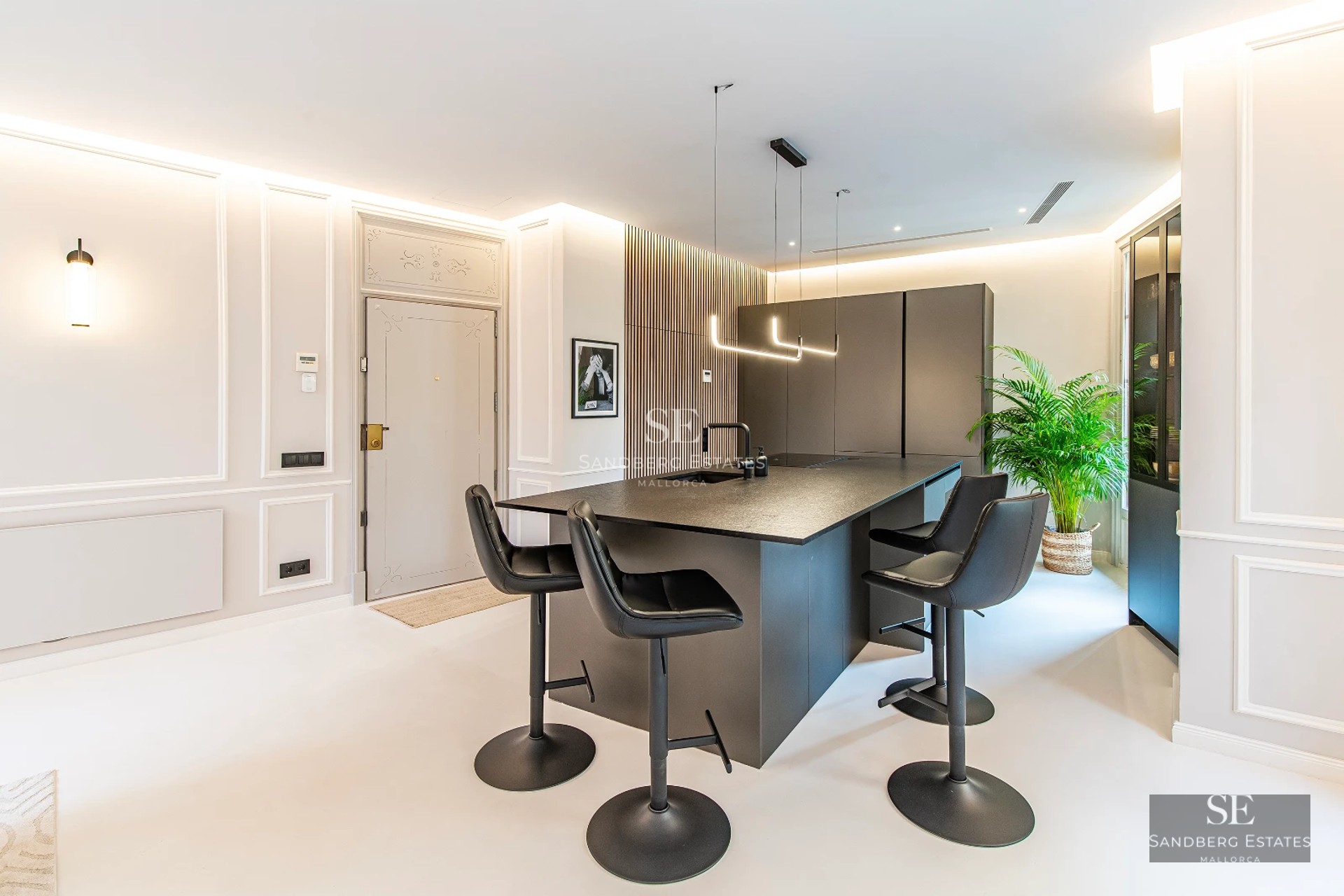 Expansive terrace with infinity pool and panoramic views. Modern design, glass railings, stylish furniture, and lush vegetation.