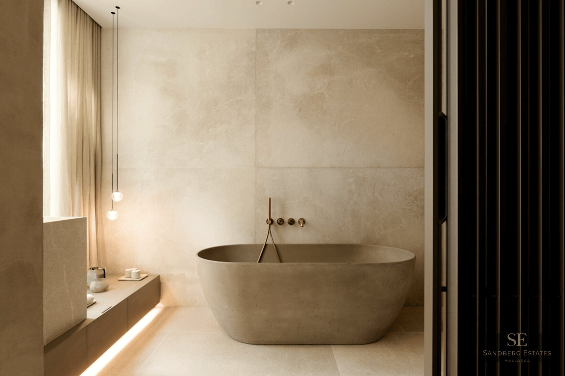 A luxury minimalist bathroom featuring a freestanding stone bathtub, travertine walls, and soft ambient lighting.