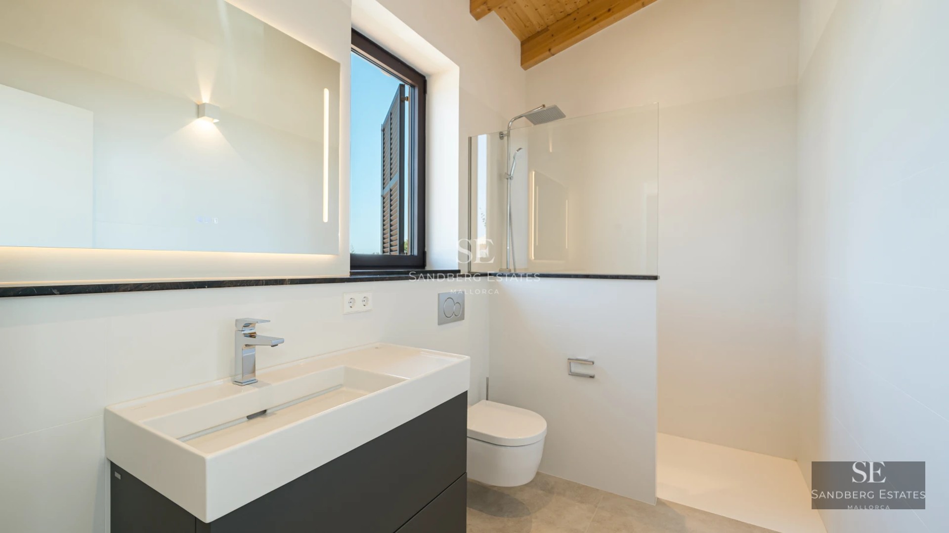 Spacious balcony overlooking the sea. Modern furniture, infinity pool, and lush tropical vegetation. Perfect for relaxation.