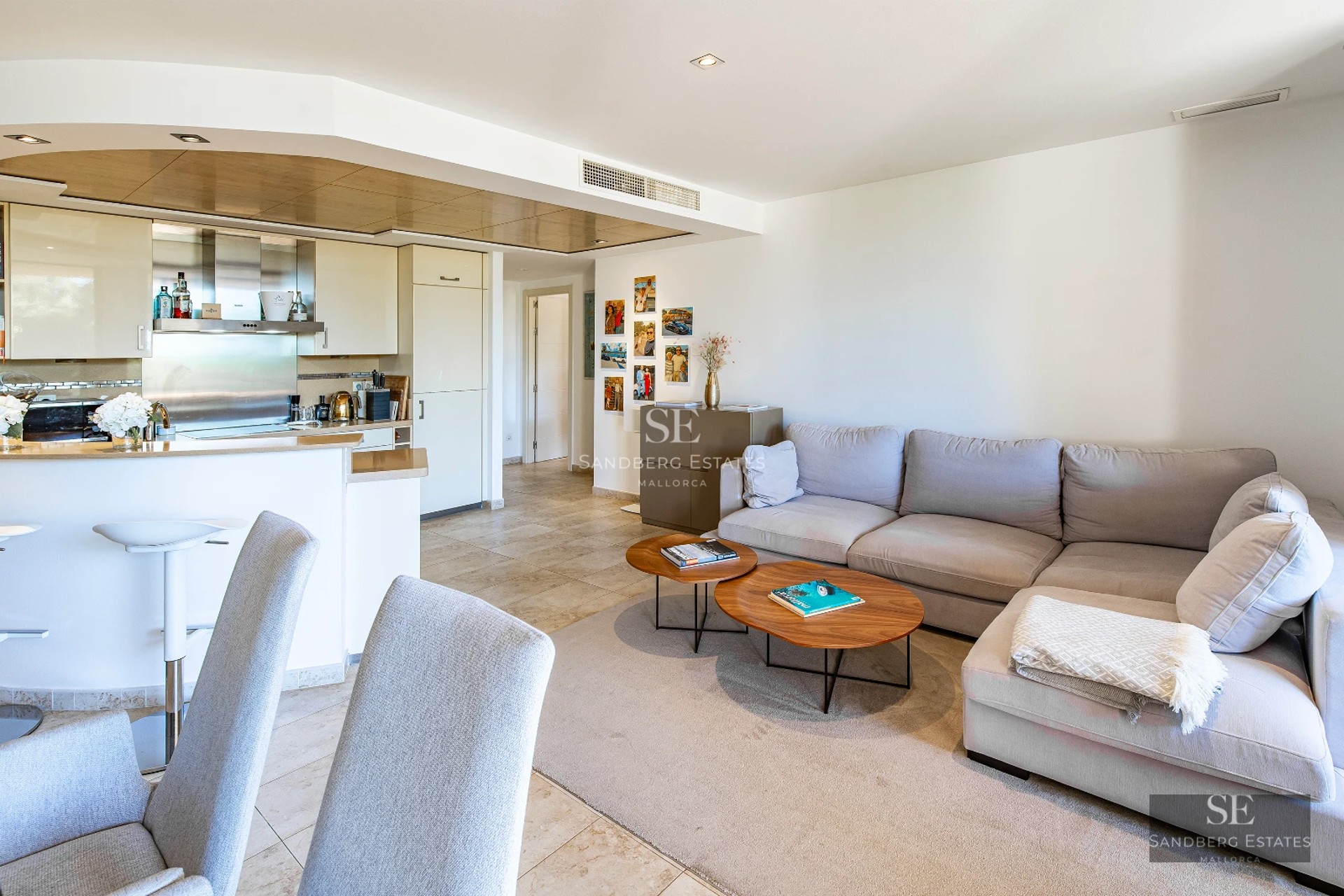 Exterior view of a modern villa featuring an infinity pool, large windows, and lush garden. Sleek and minimalist architectural design.