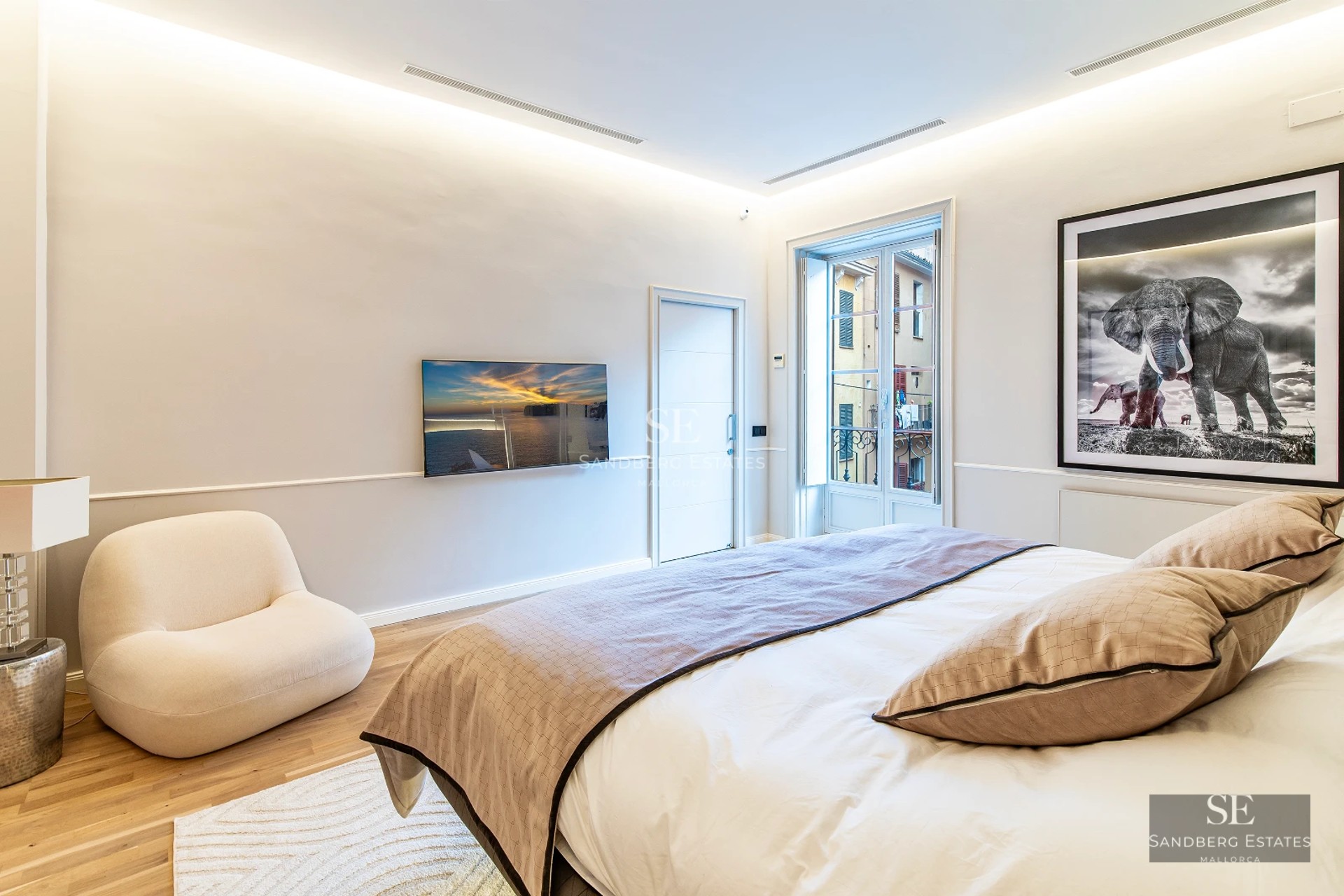 Spacious terrace with infinity pool, sun loungers, and panoramic views. Modern design with elegant furnishings.