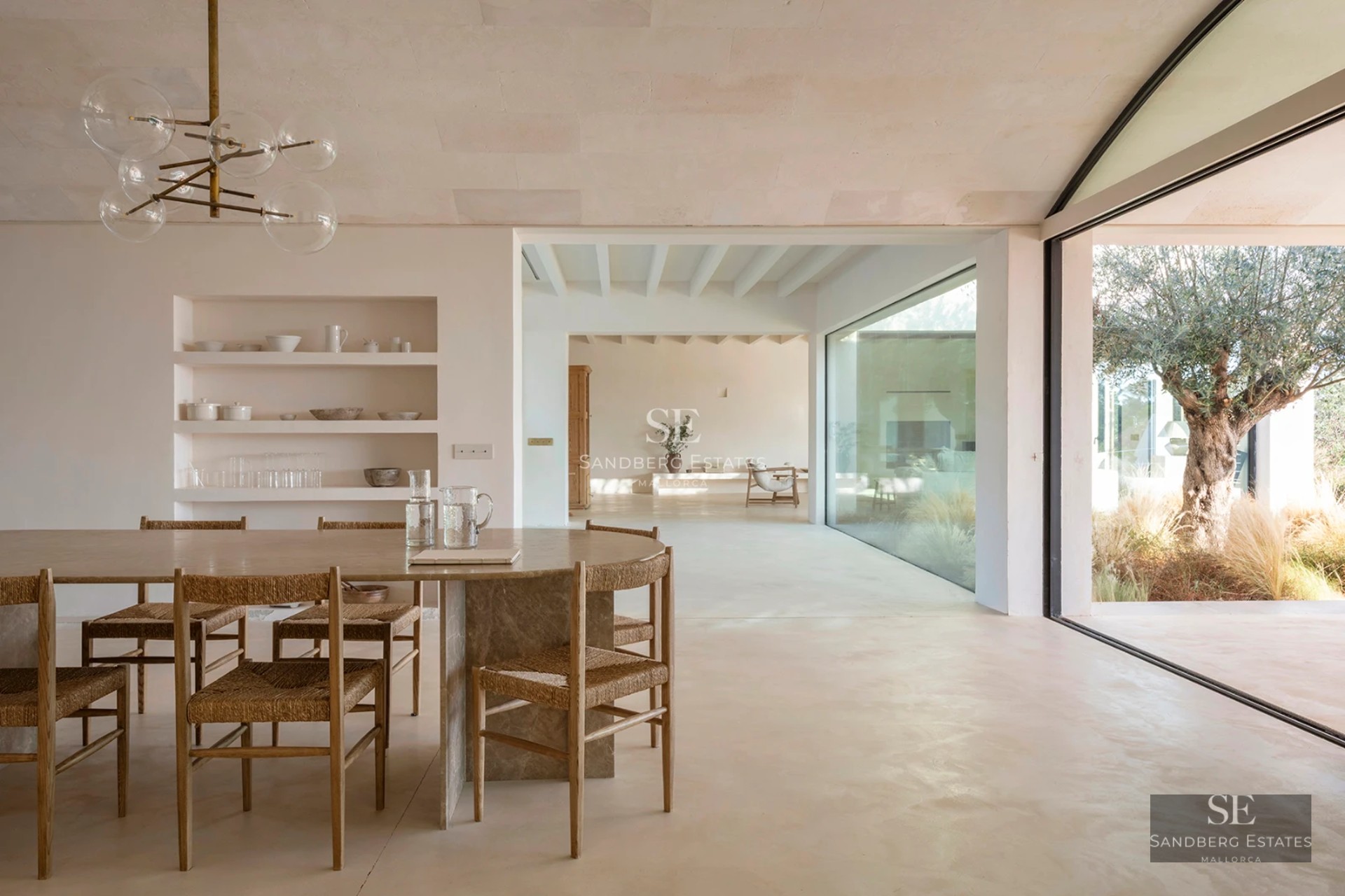 Spacious terrace featuring an infinity pool, sun loungers, and panoramic views. Modern design with high-quality materials.