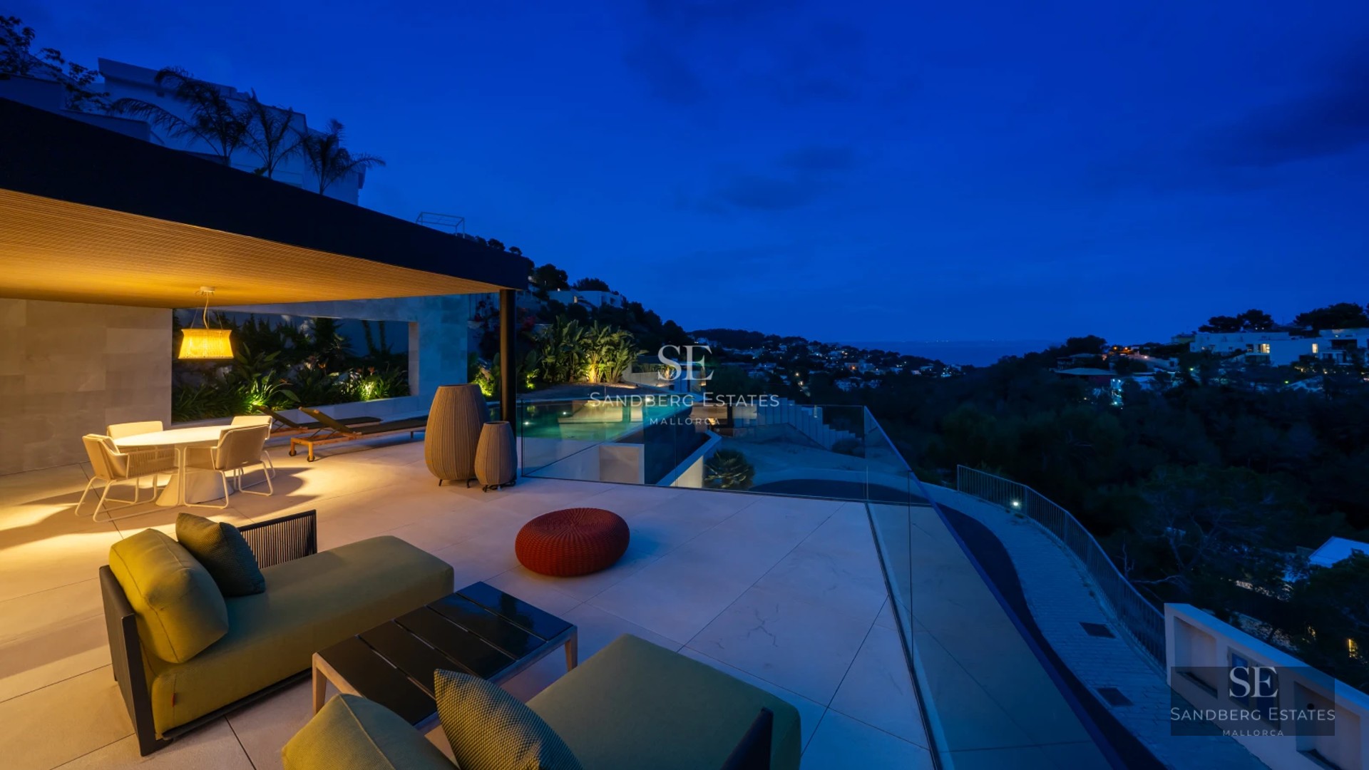 Exterior view of a modern house with a pool, garden, and spacious terraces. Minimalist design, large windows, and lush vegetation.