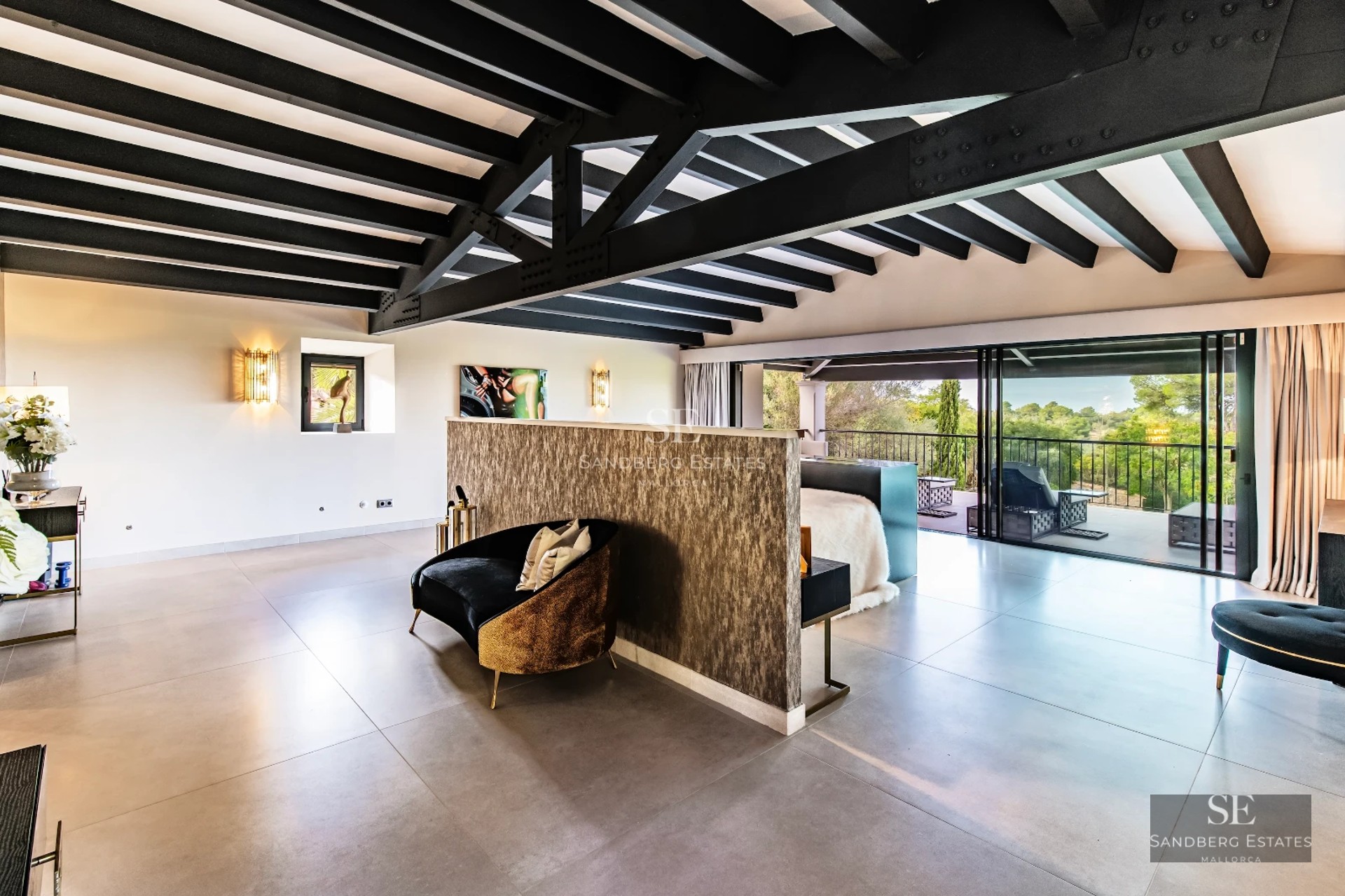 Spacious terrace with infinity pool and ocean views. Modern architecture with glass railing and stylish outdoor furniture.