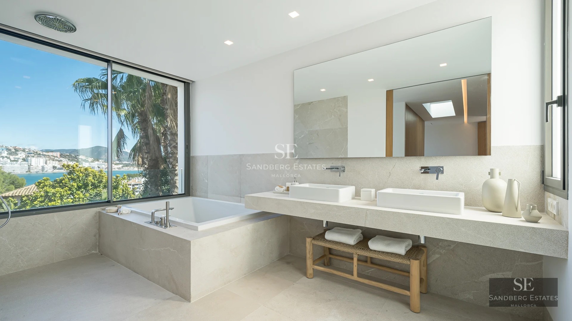 View of a modern villa with infinity pool. Large windows, minimalist architecture, lush natural surroundings.