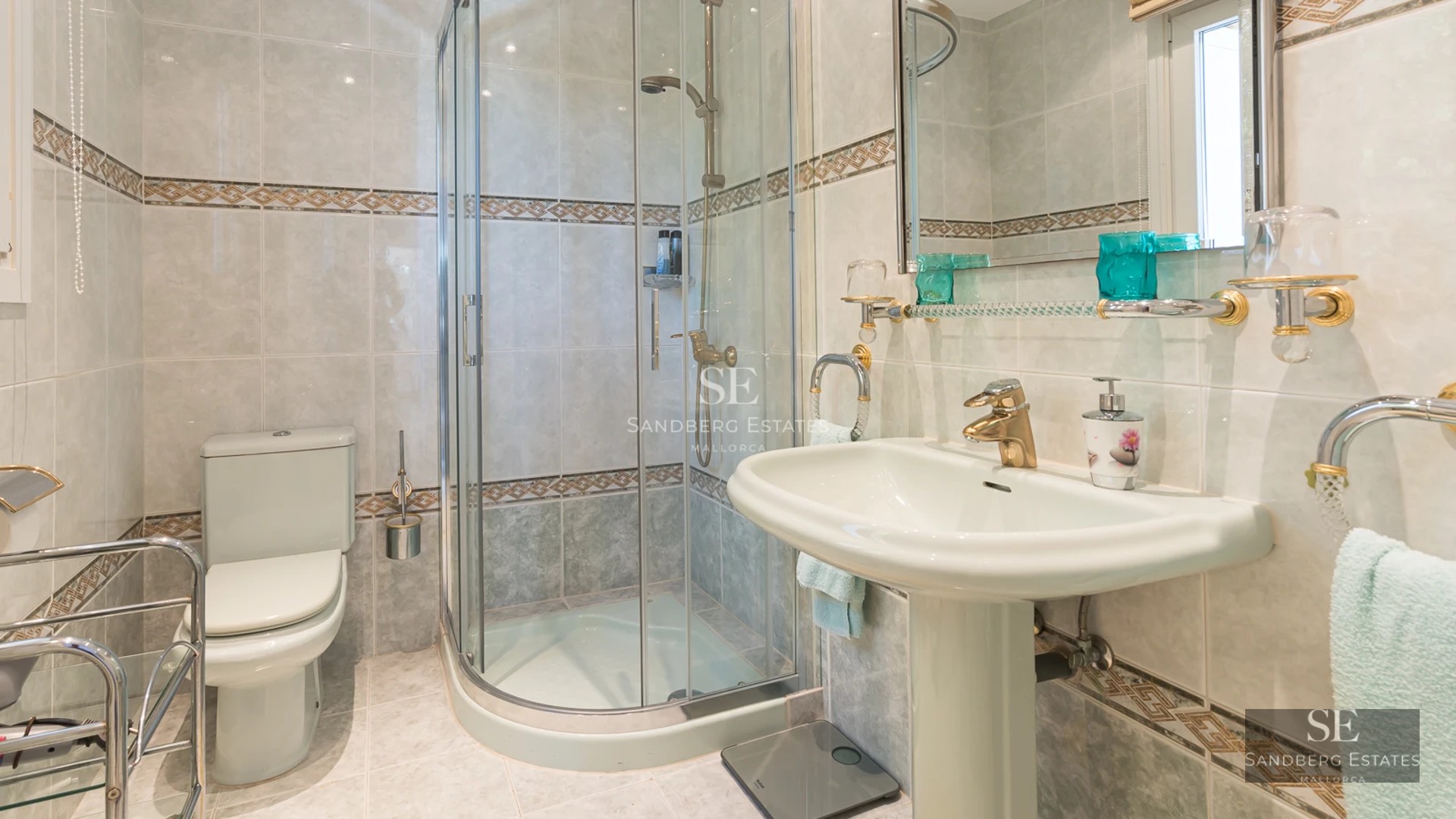 Exterior view of a modern villa with infinity pool, lush gardens, and expansive terraces. Contemporary architecture and manicured landscaping.