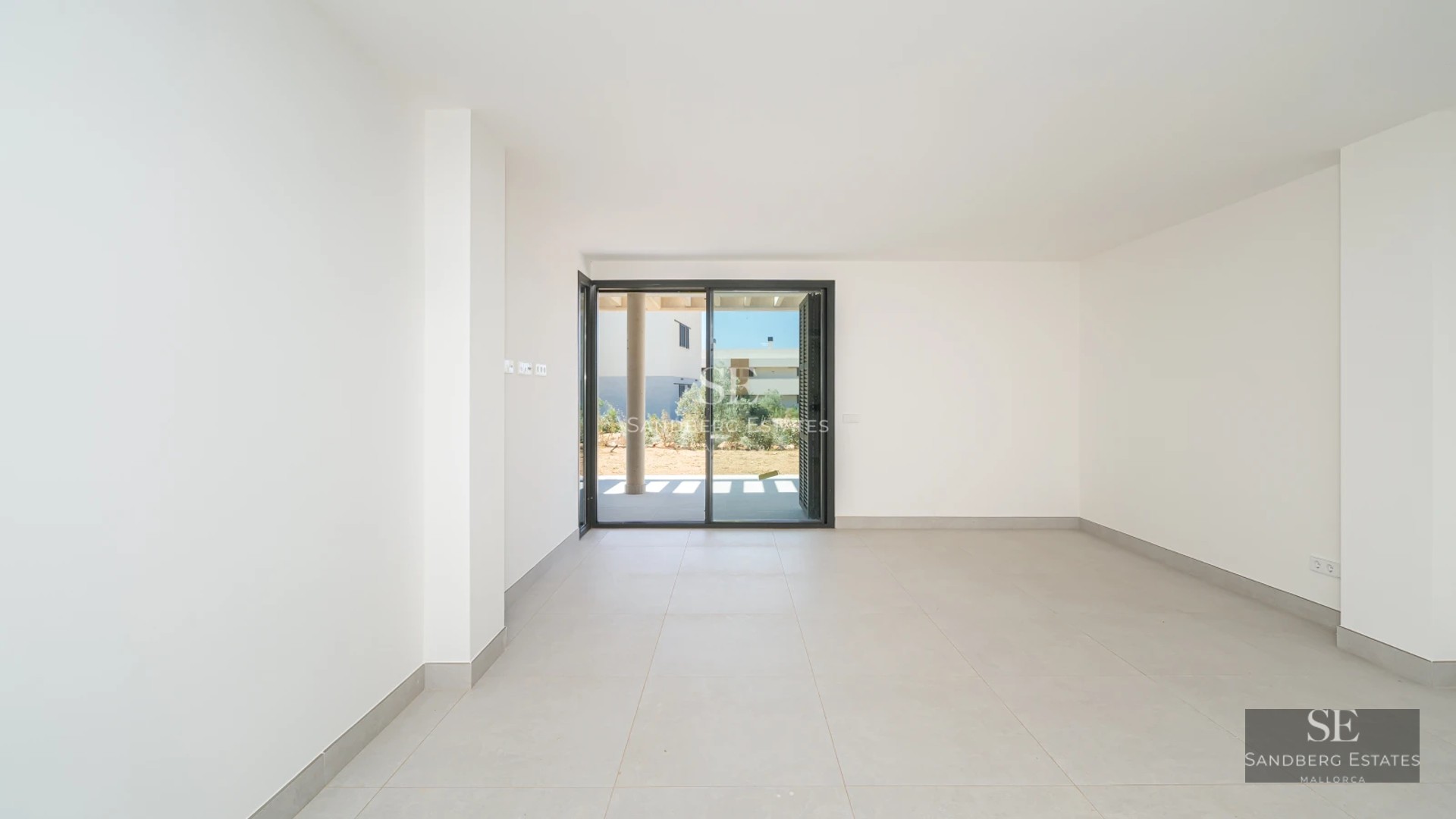 Expansive terrace featuring an infinity pool with panoramic views. Modern, minimalist architecture. Ambient lighting.