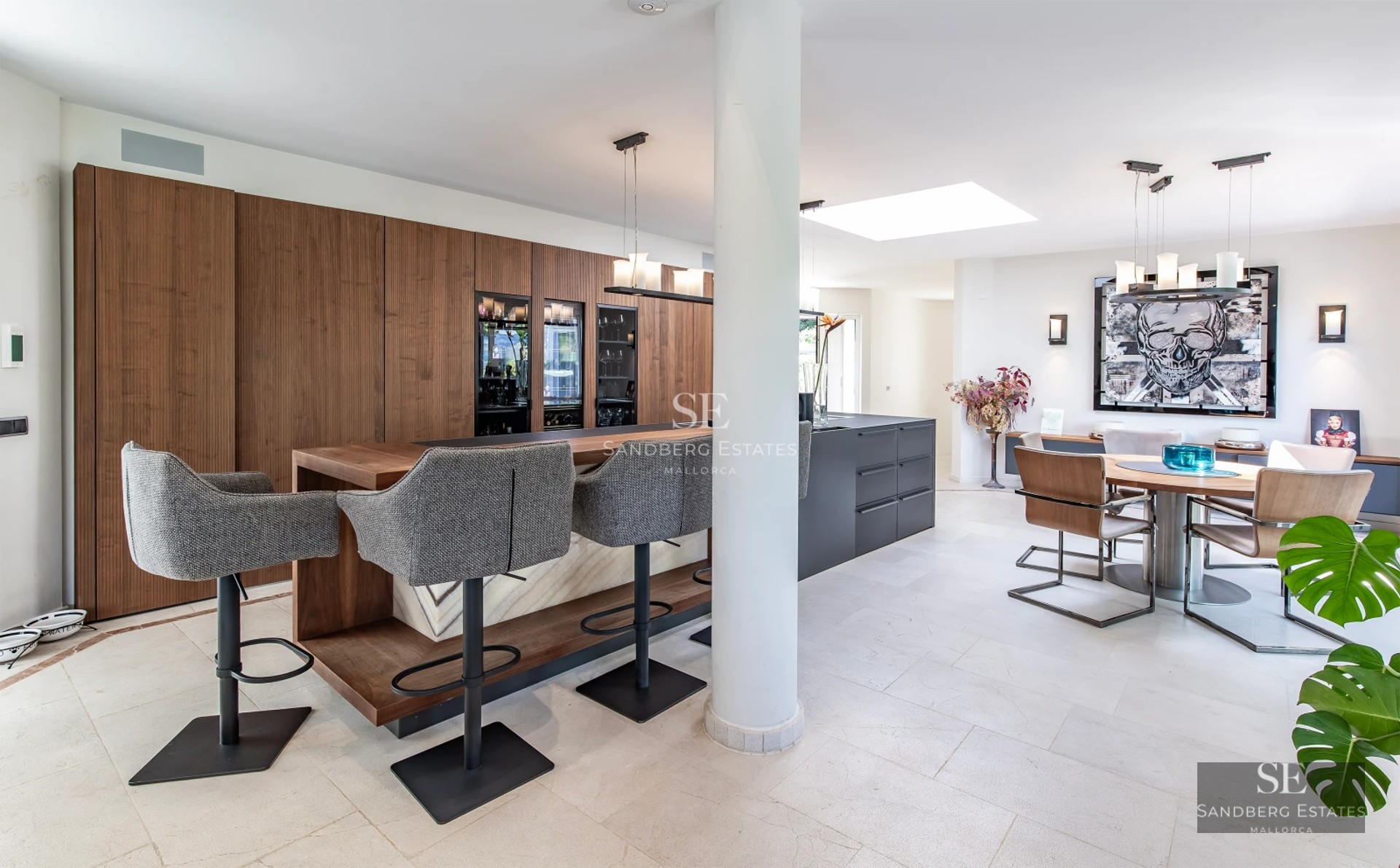 Exterior view of a modern property featuring a pool, garden, and terrace. Minimalist architecture with large windows.