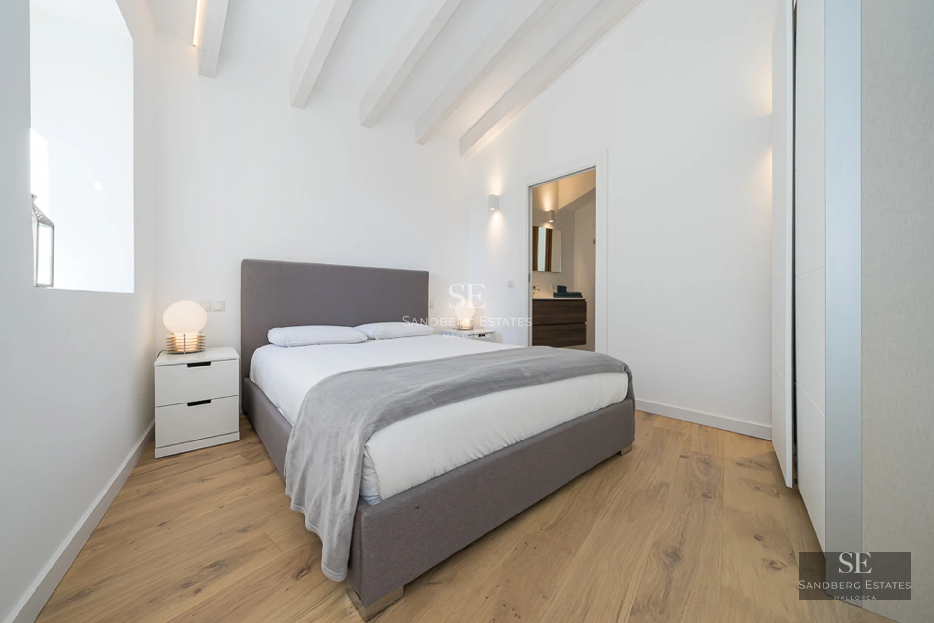 Panoramic view of a modern villa with a pool, lush garden, and spacious terraces. Elegant and minimalist design.