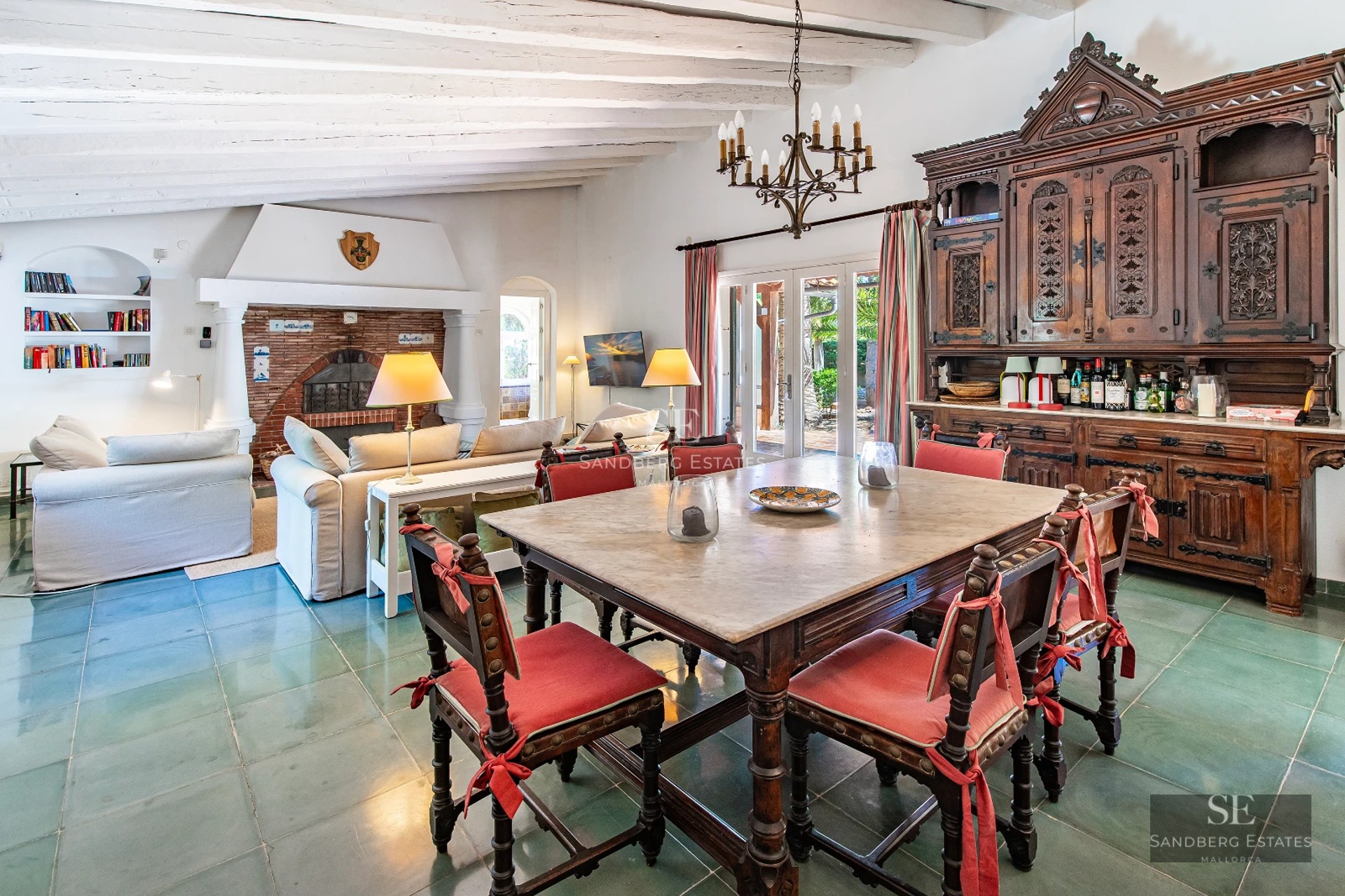 Exterior of a modern villa with a reflecting pool. Minimalist architecture, large windows, and lush vegetation.