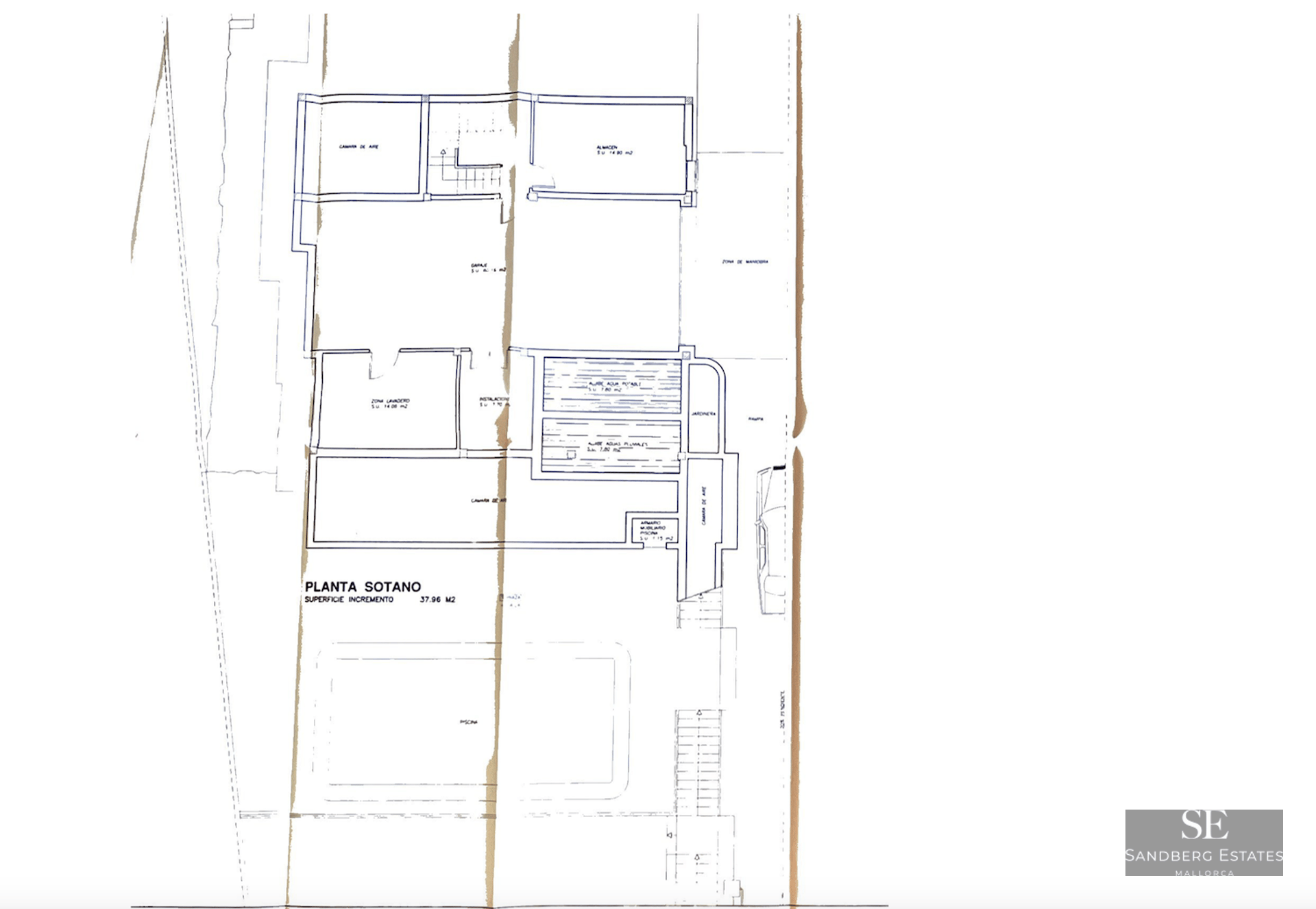 Architectural drawing showing the basement layout, including a garage, storage, and laundry areas.