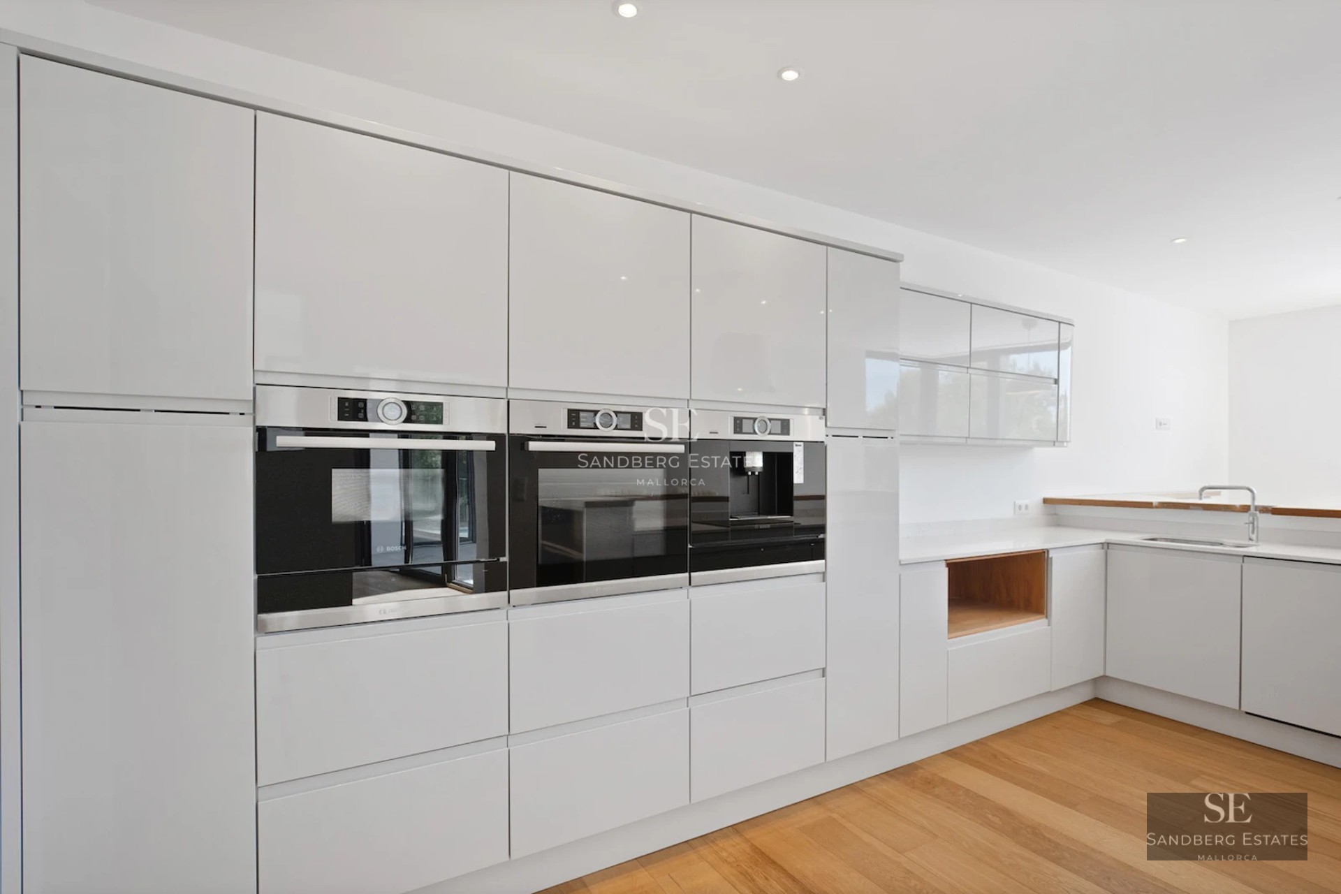 Expansive terrace with infinity pool, panoramic views. Modern design with elegant outdoor furniture and lush greenery.