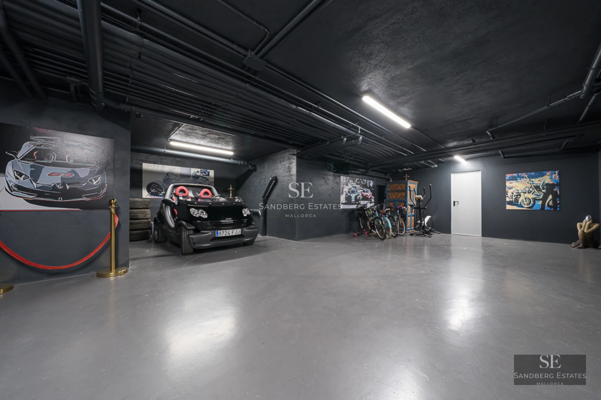 Bright living room with large windows, light wood floors, and elegant furniture. Panoramic sea views and integrated balcony.