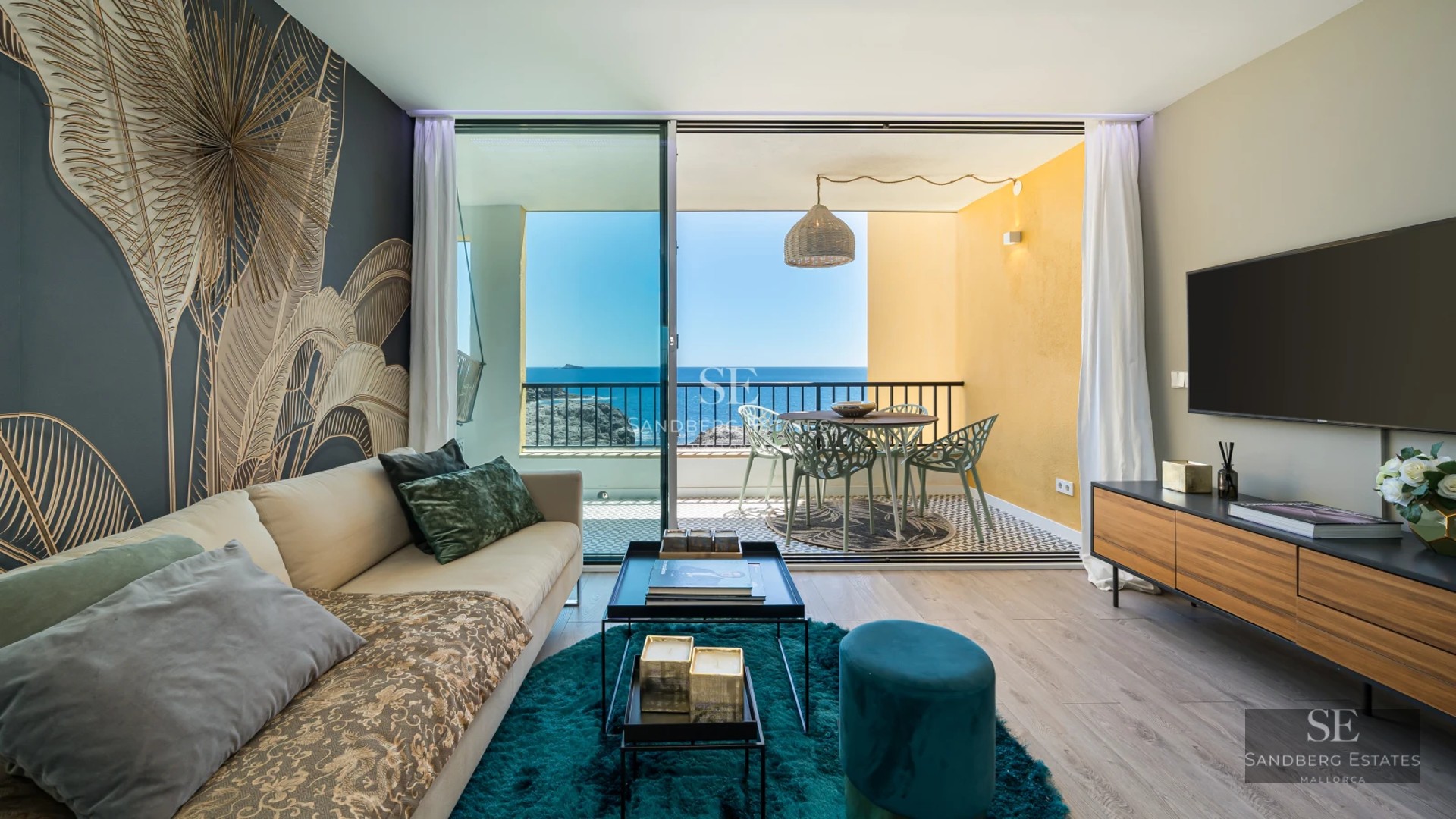 Exterior view of a modern villa featuring an infinity pool, gardens, and spacious open areas. Minimalist architecture and high-end finishes.