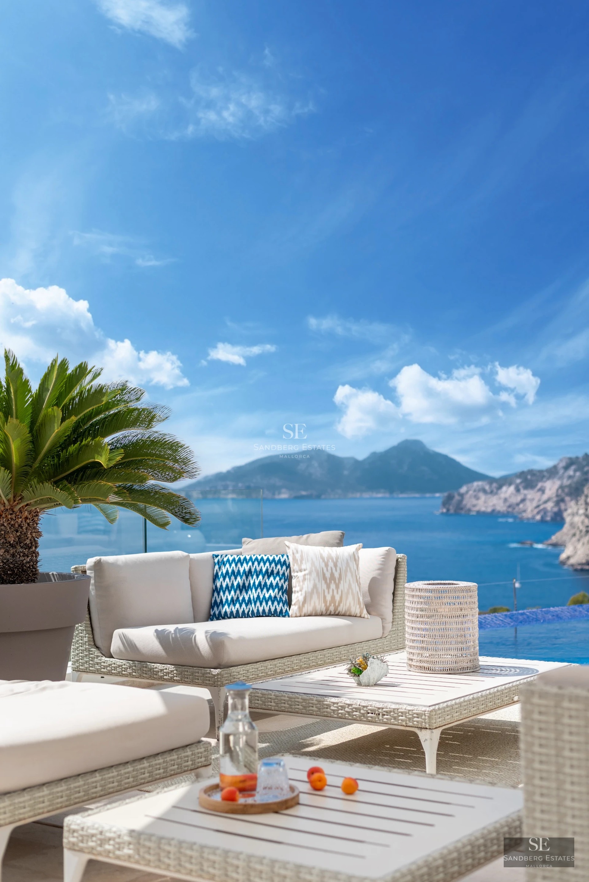 View of an elegant pool with terrace. Modern architecture, sun loungers, and lush greenery. Perfect for relaxation.