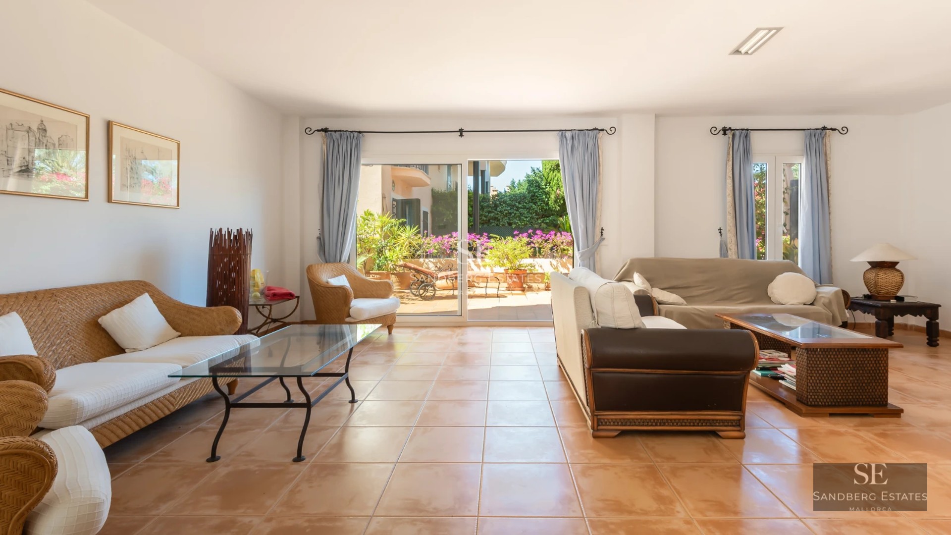 Exterior view of a modern villa featuring an infinity pool and lush garden. Minimalist architecture with large windows and expansive terraces.