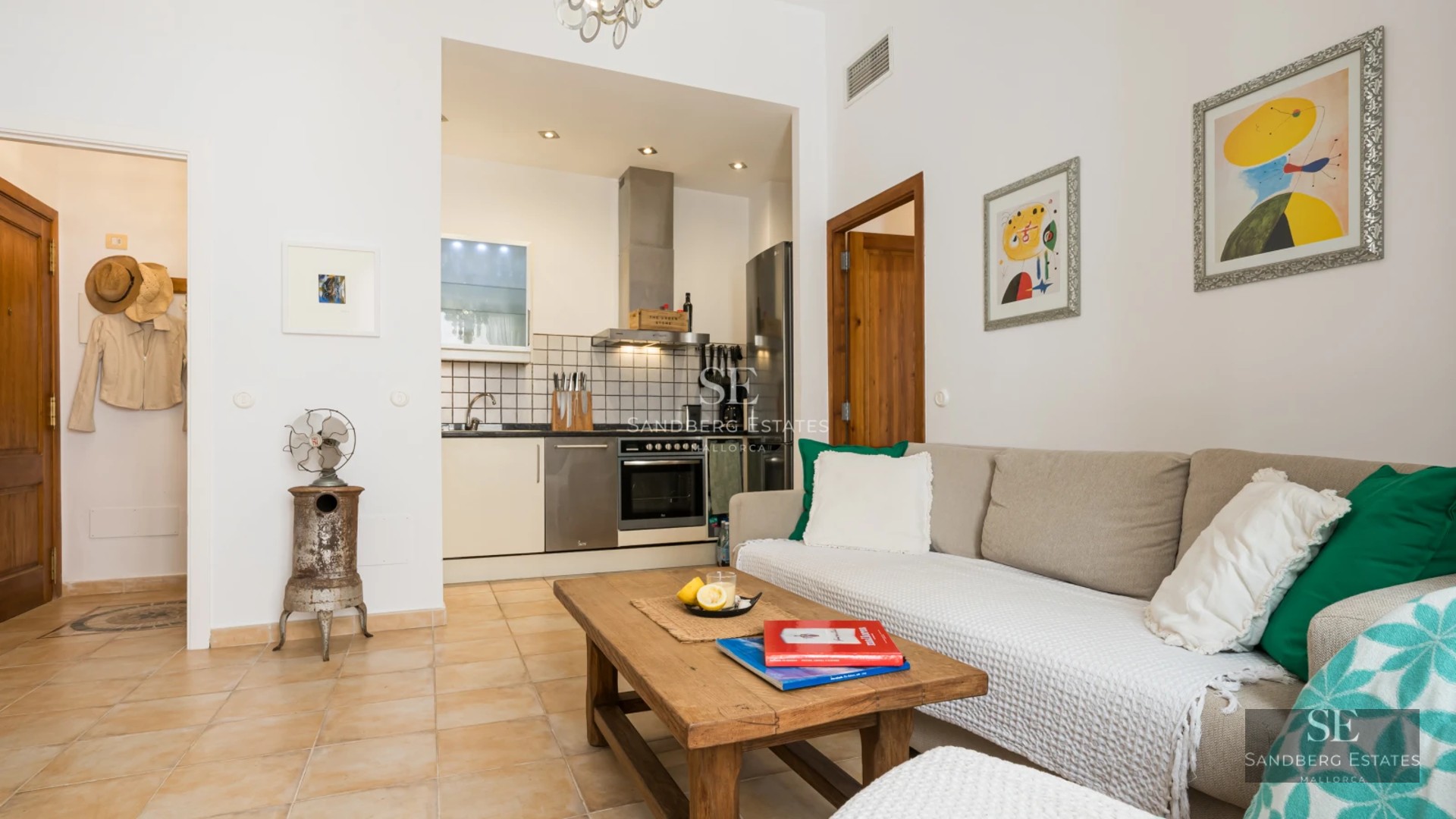 Spacious living room with pool and sea view. Large windows, light wood floors, modern furniture and terrace with direct pool access.