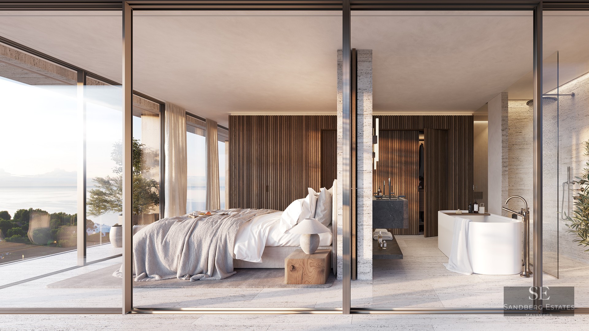 A modern master bedroom and ensuite bathroom separated by glass, featuring a sea view and wood paneling.